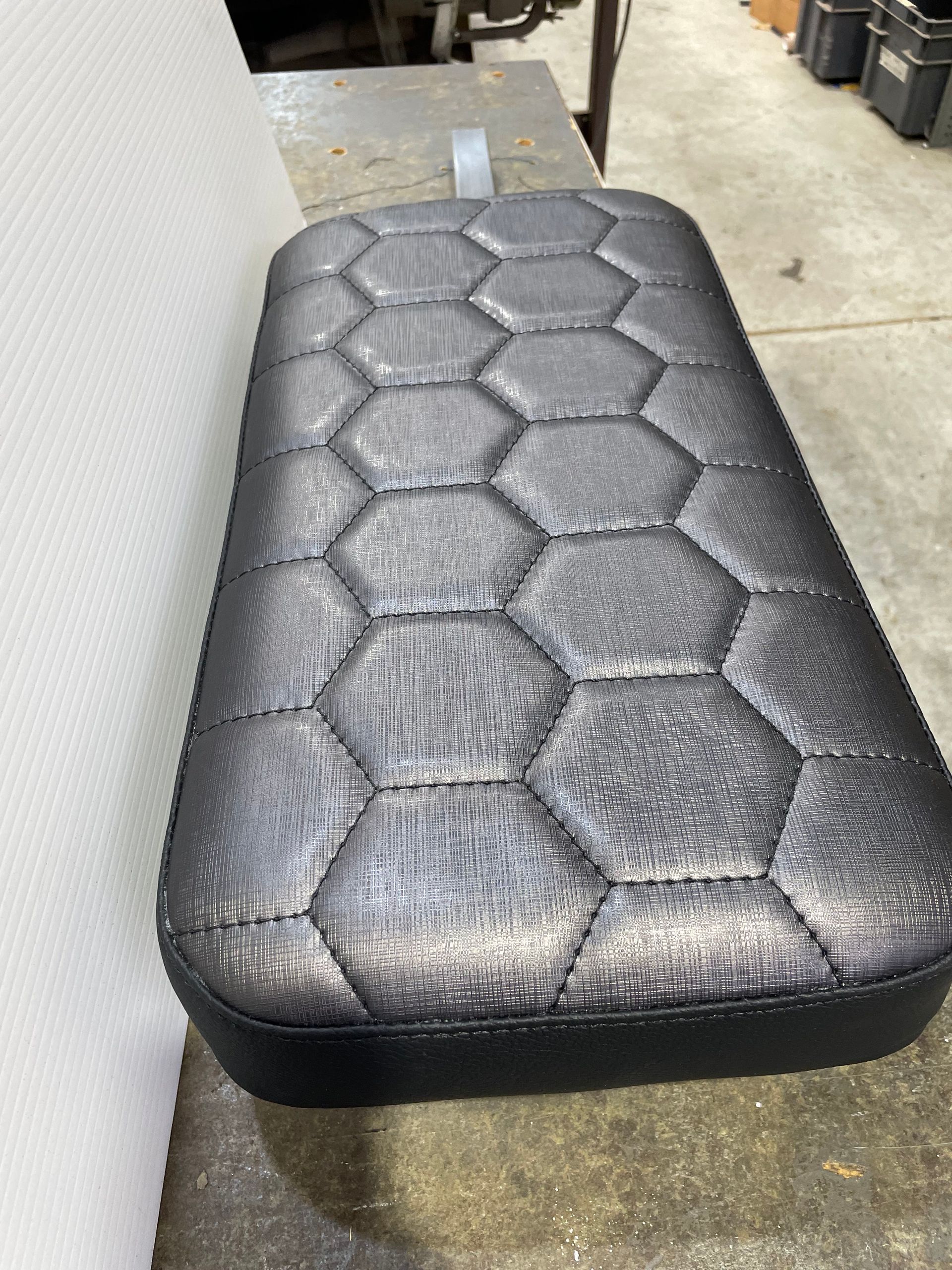 Custom designed padded cushion metallic vinyl with honeycomb pattern stitching