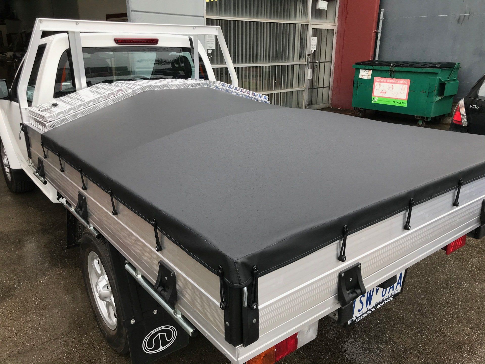 Custom fit tonneau to front tool box