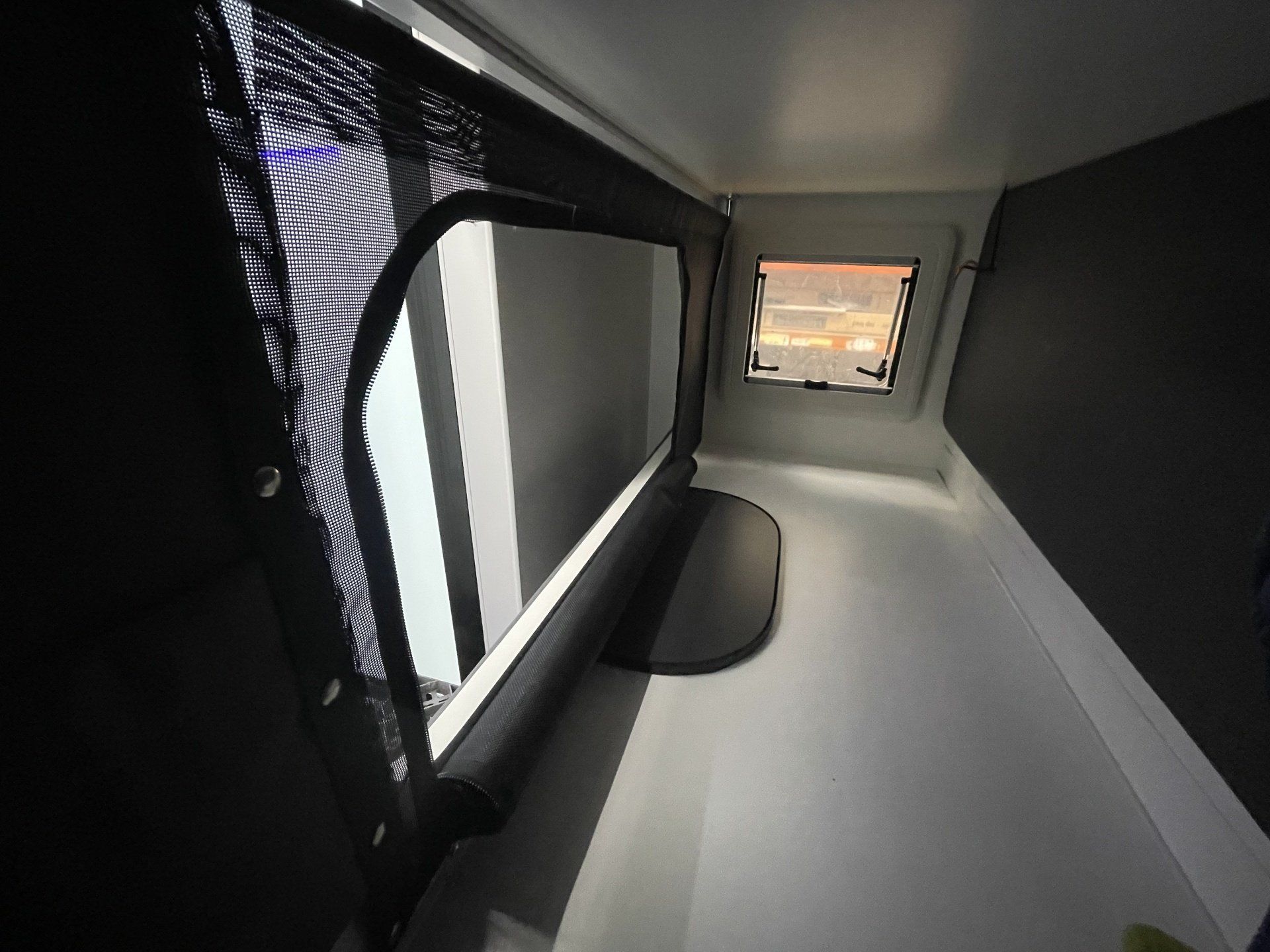 Double bunks with kid safe mesh screens with zip openings inside