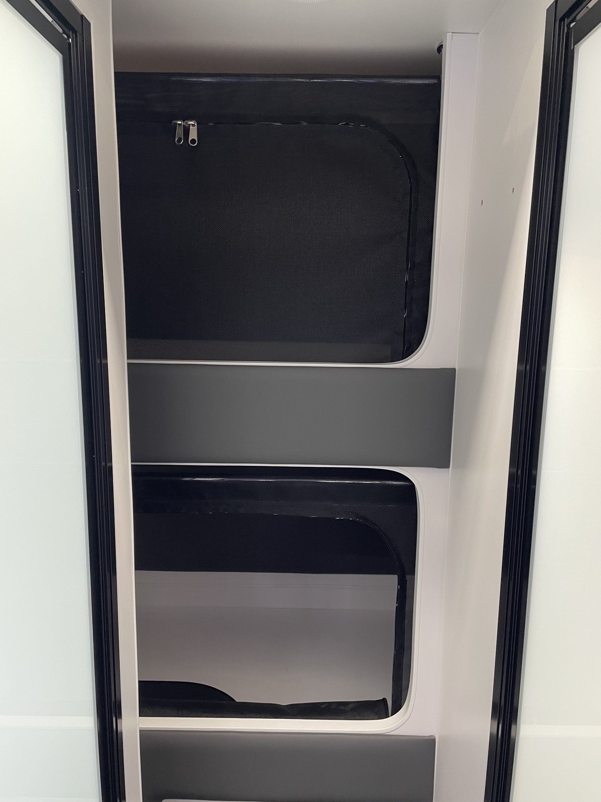 Double bunks with kid safe mesh screens with zip openings