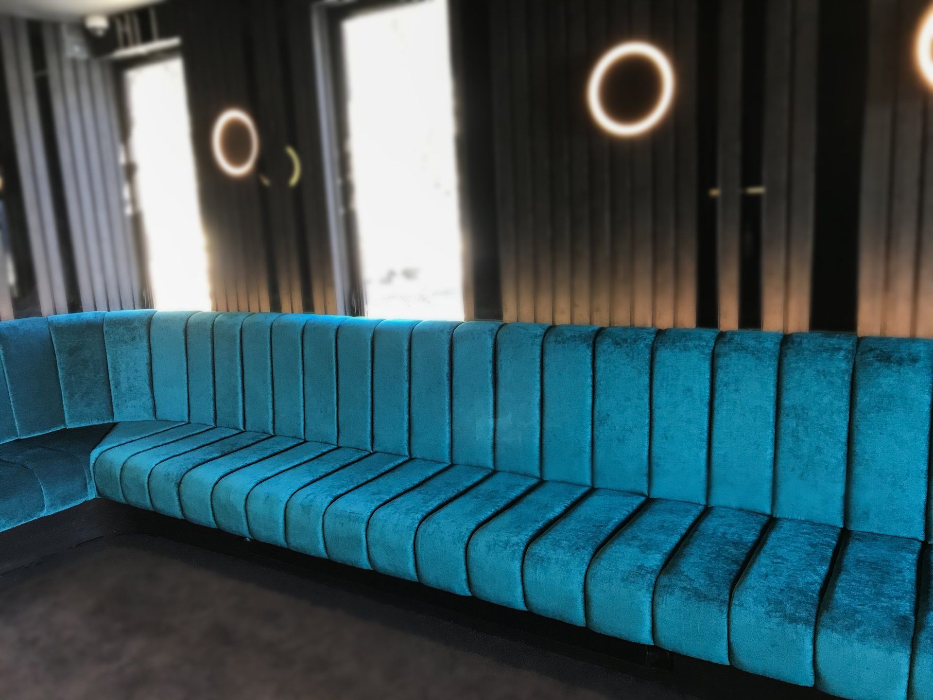 Elk Ski Lodge formal bar electric blue velvet custom build wall seating