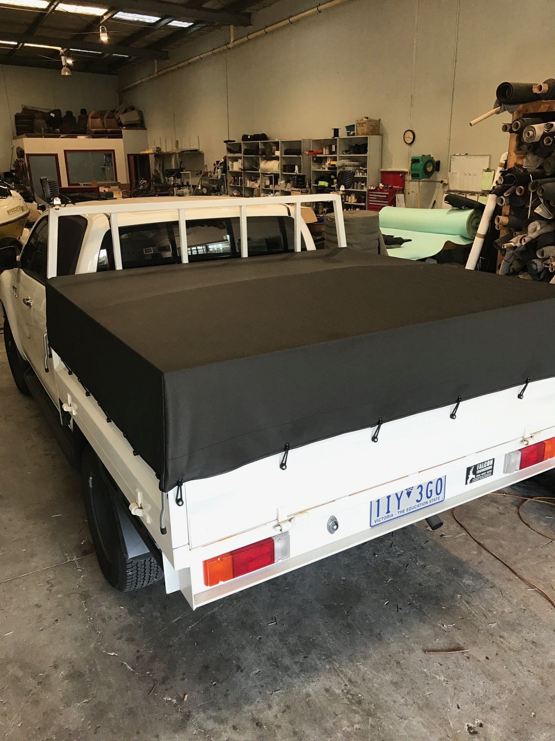 Extension frame tonneau cover