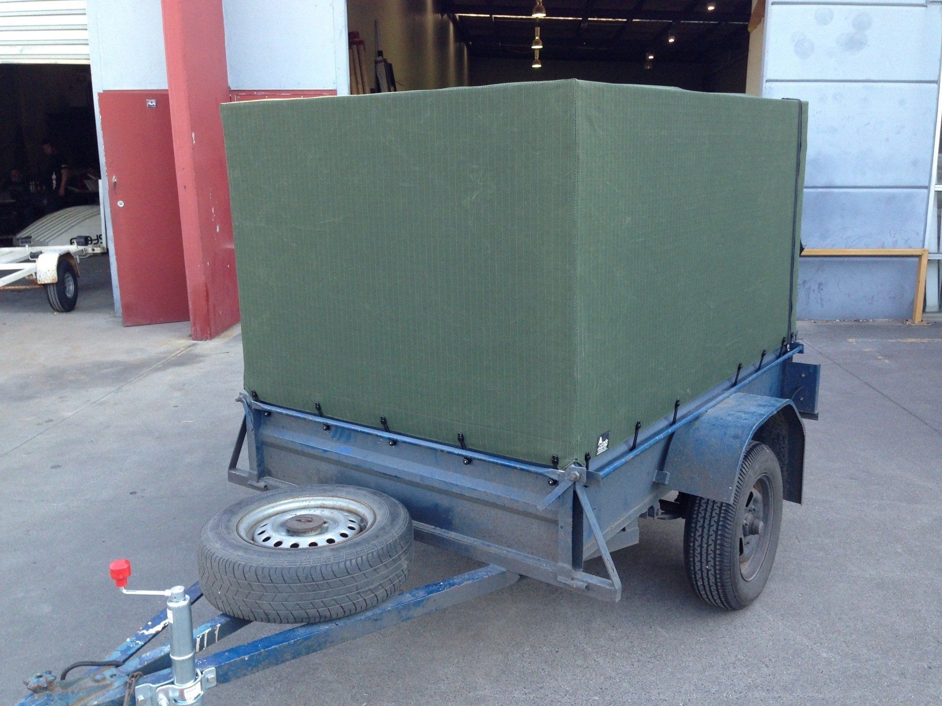 Green canvas cover for trailer