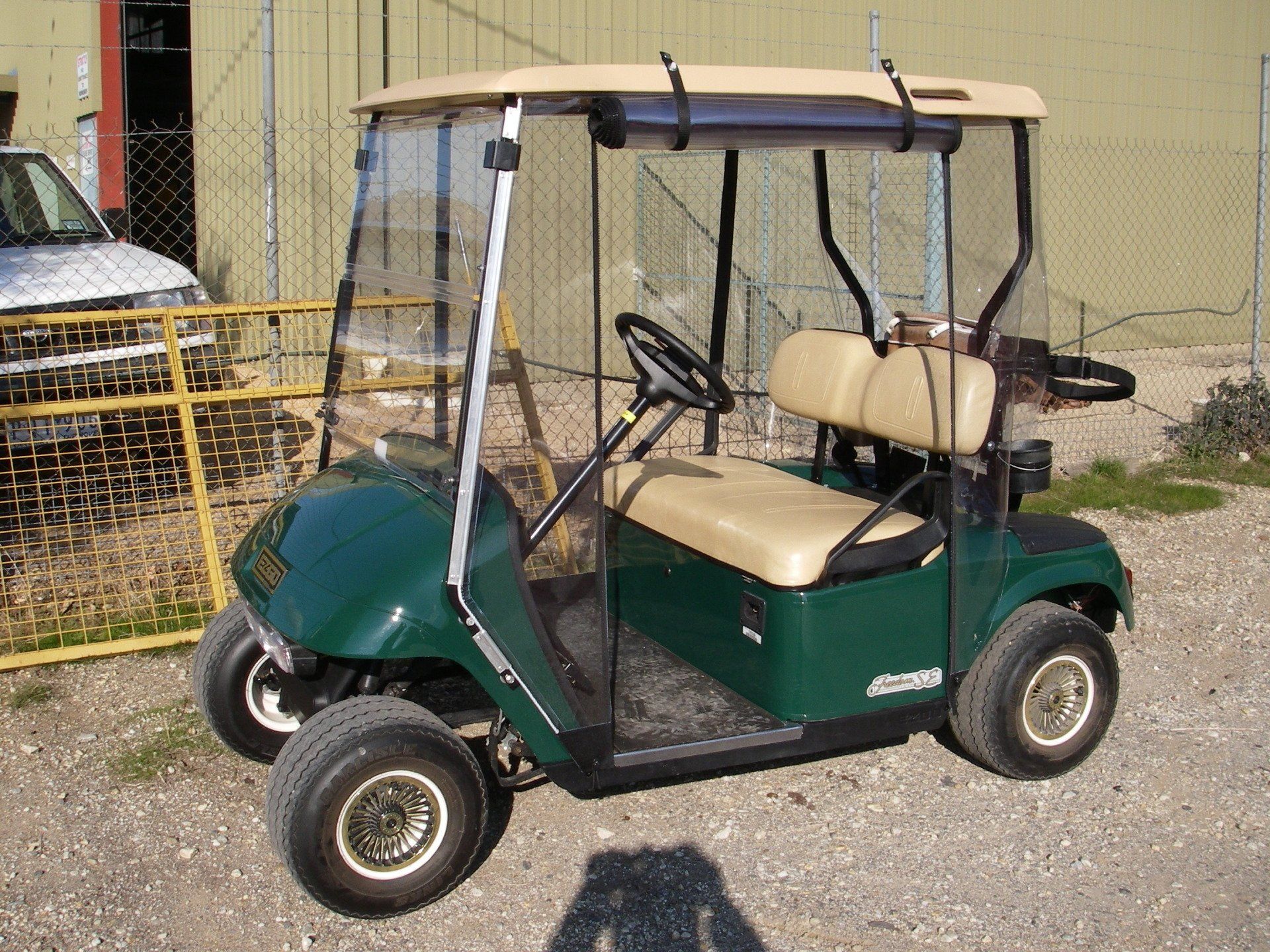 Green golf buggy clear plastic curtains