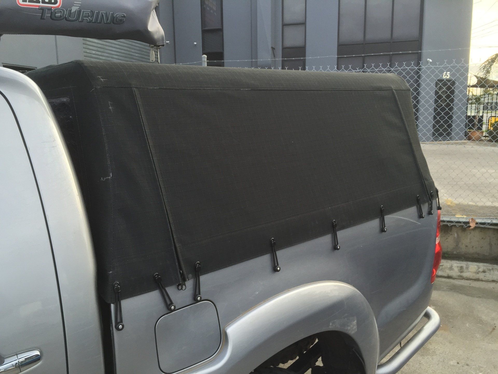 Hilux canopy canvas cover over sportsbar frame