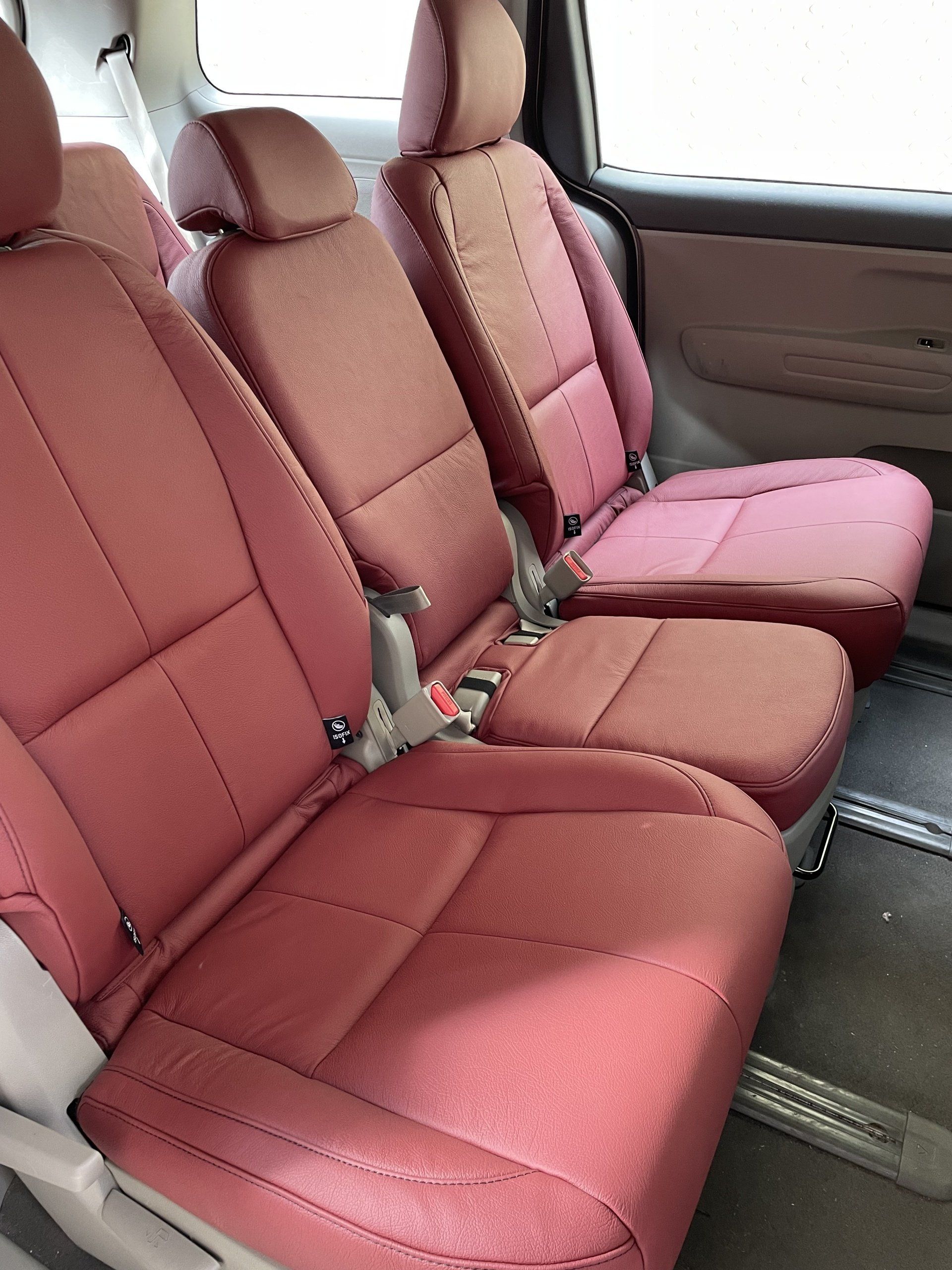 Kia Carnival red leather seat conversion rear