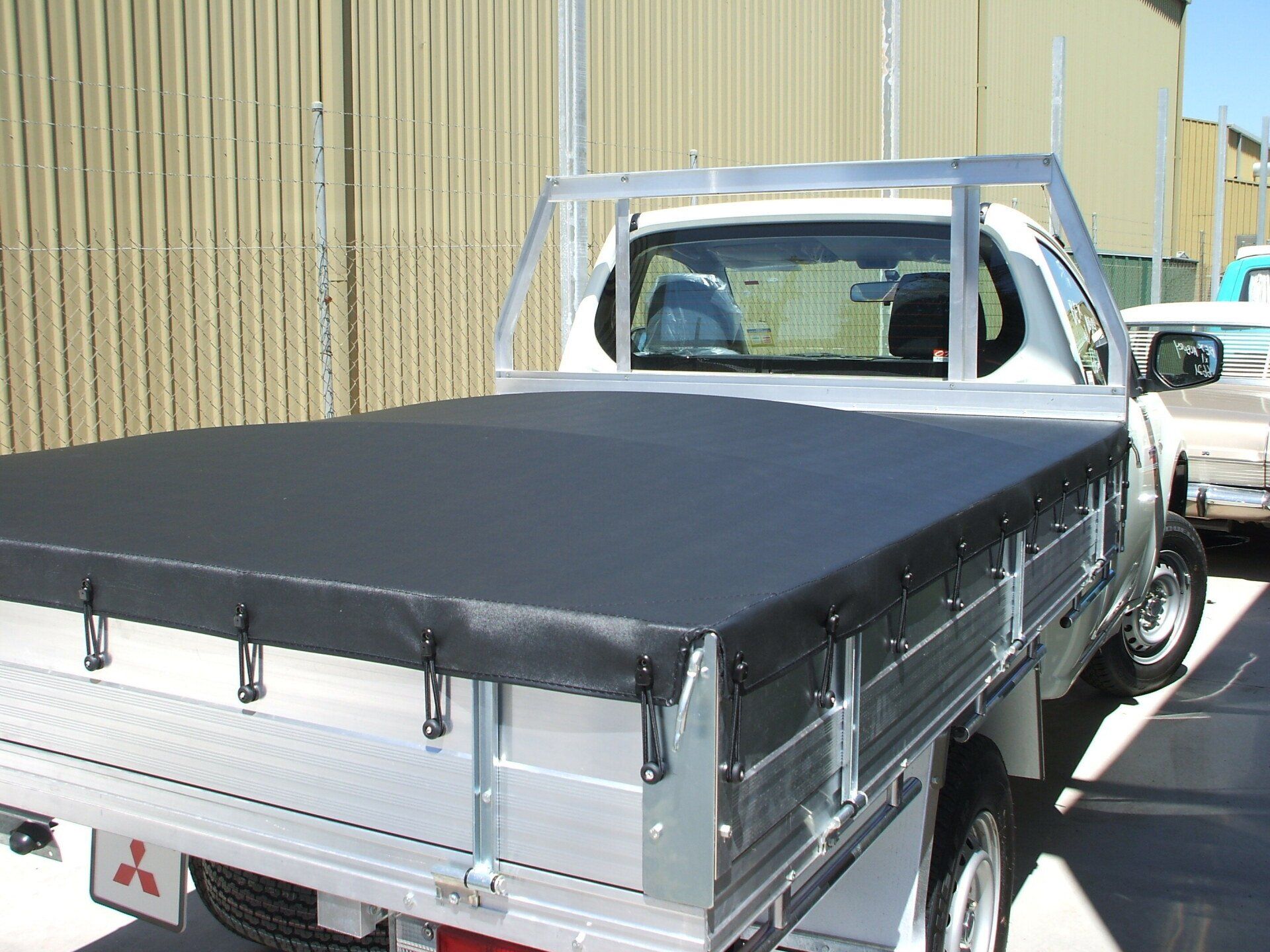 Mitsubishi Ute with Aluminium Tray Tonneau Cover