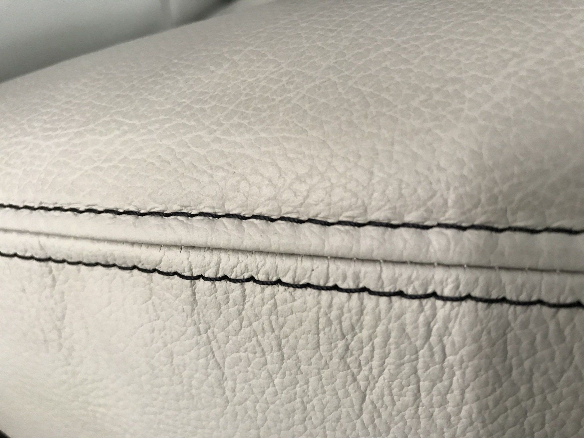 Motorhome lounge close up of black boot stitch