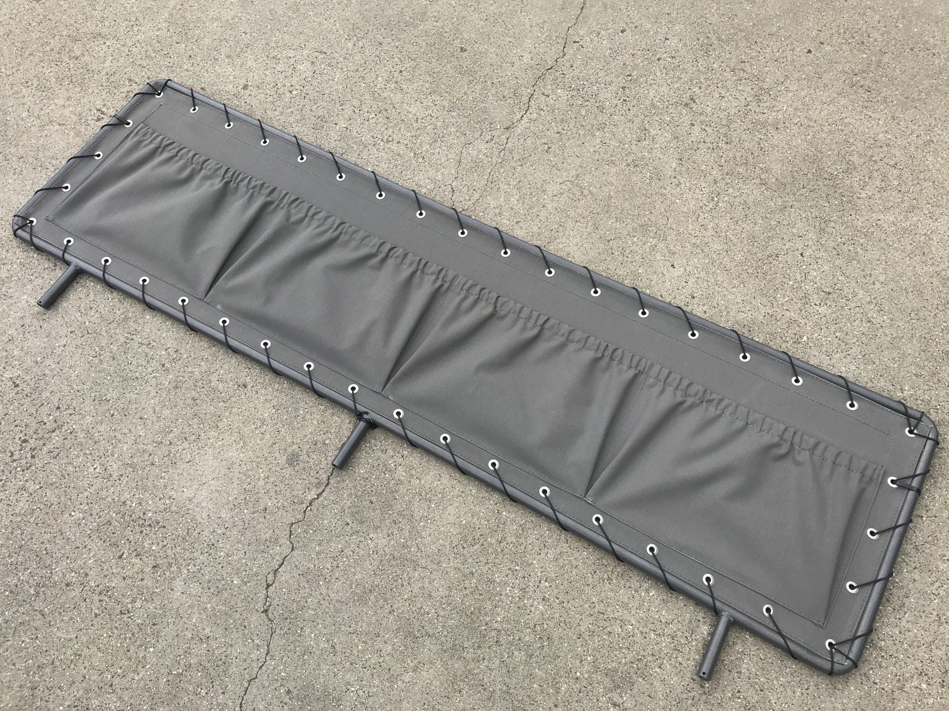 PVC cover with 4 storage pockets on tubular frame
