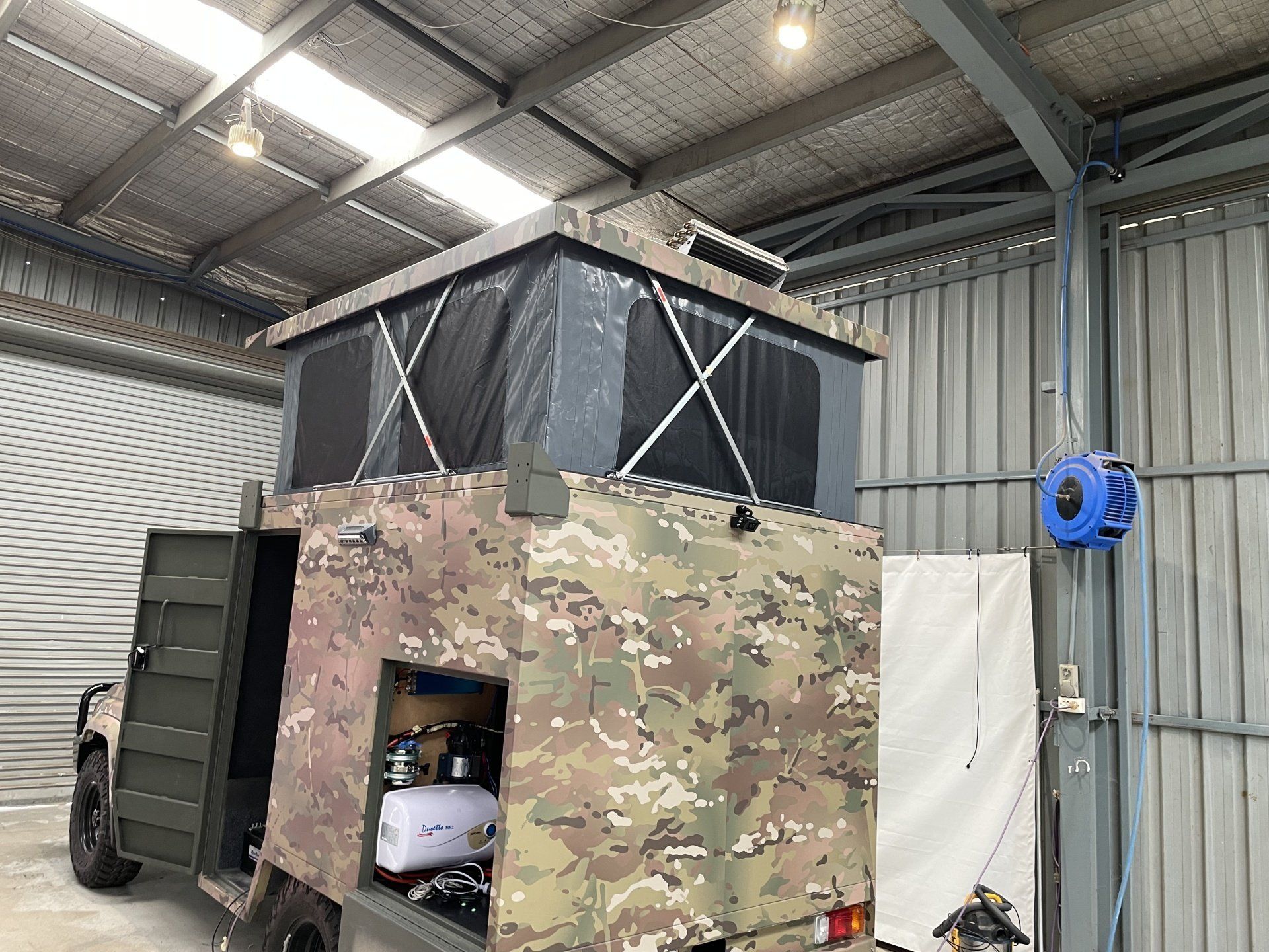 PVC pop top on custom 4WD camperback