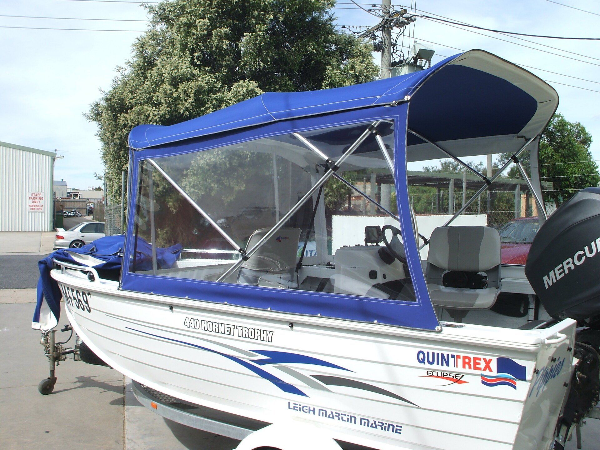 Quintrex 440 Hornet Trophy with Bimini, Clear Front and Side Curtains
