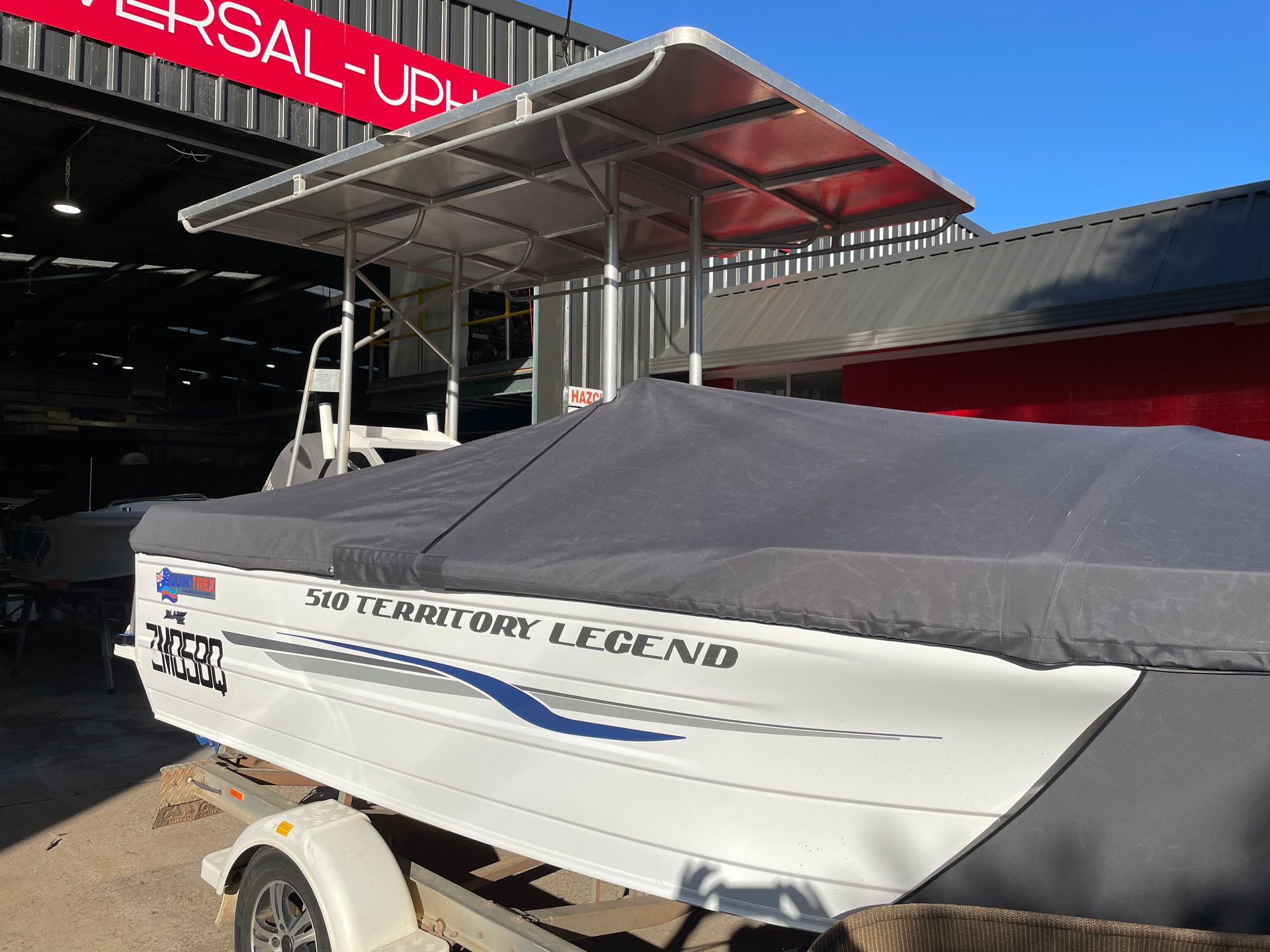 Quintrex 510 Territory Legend towing cover with stone skirts