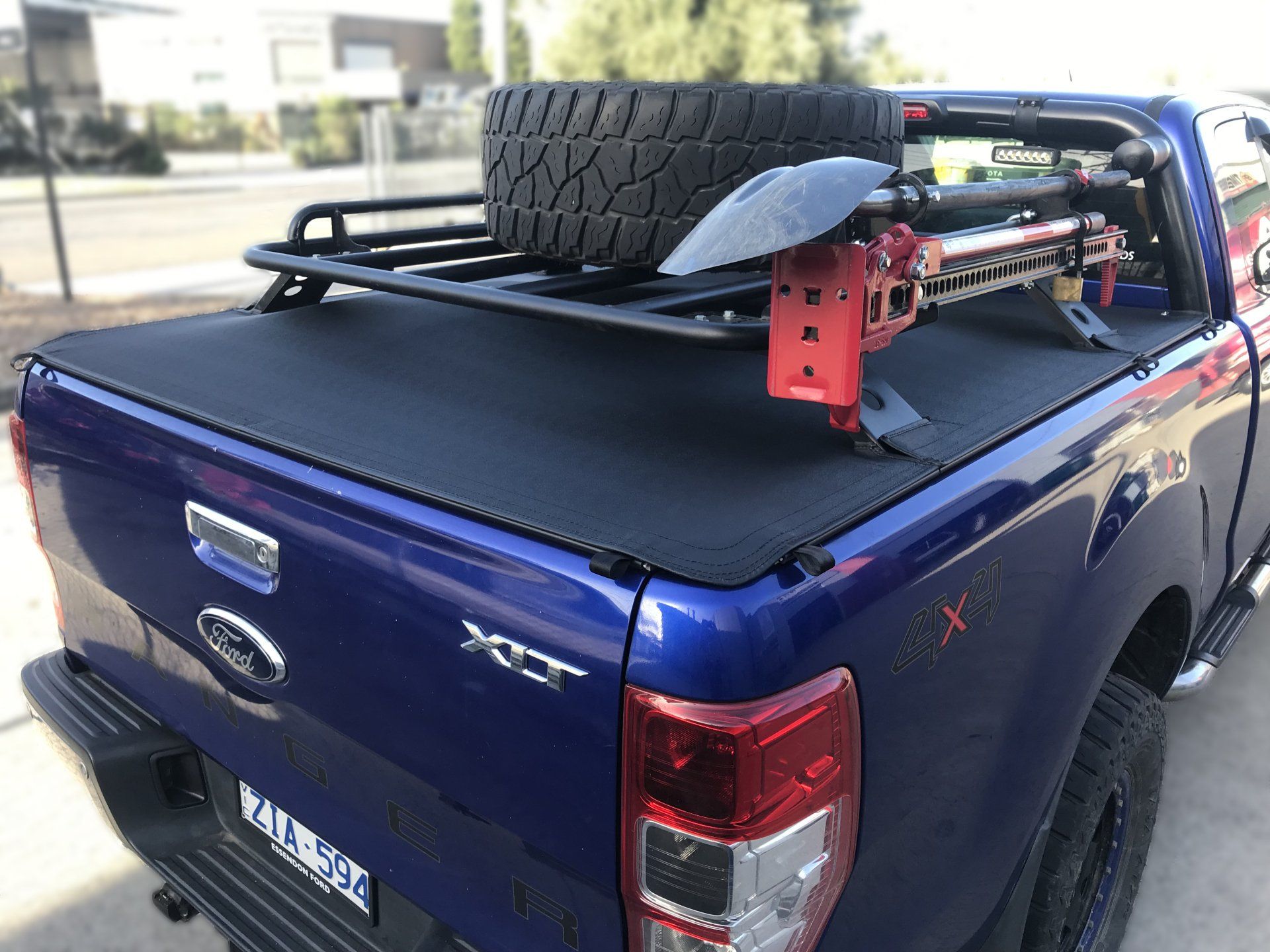 Ranger XLT custom fit tonneau with carry rack