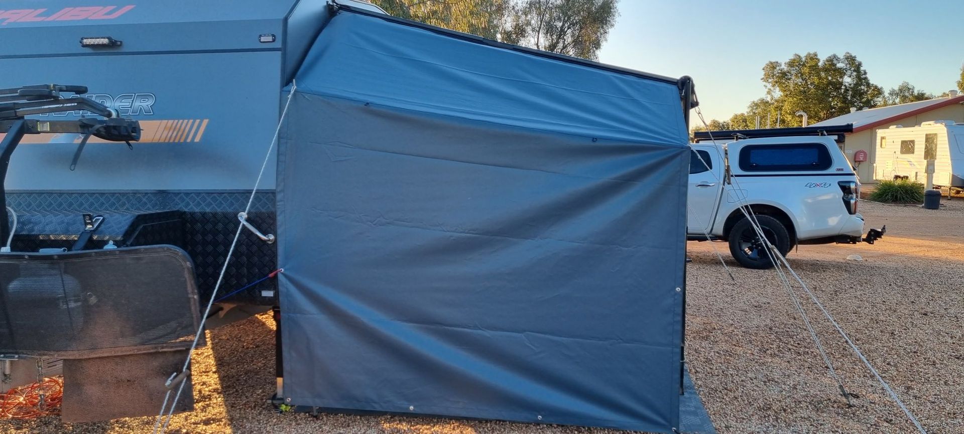 Rollout awning canvas end enclosure