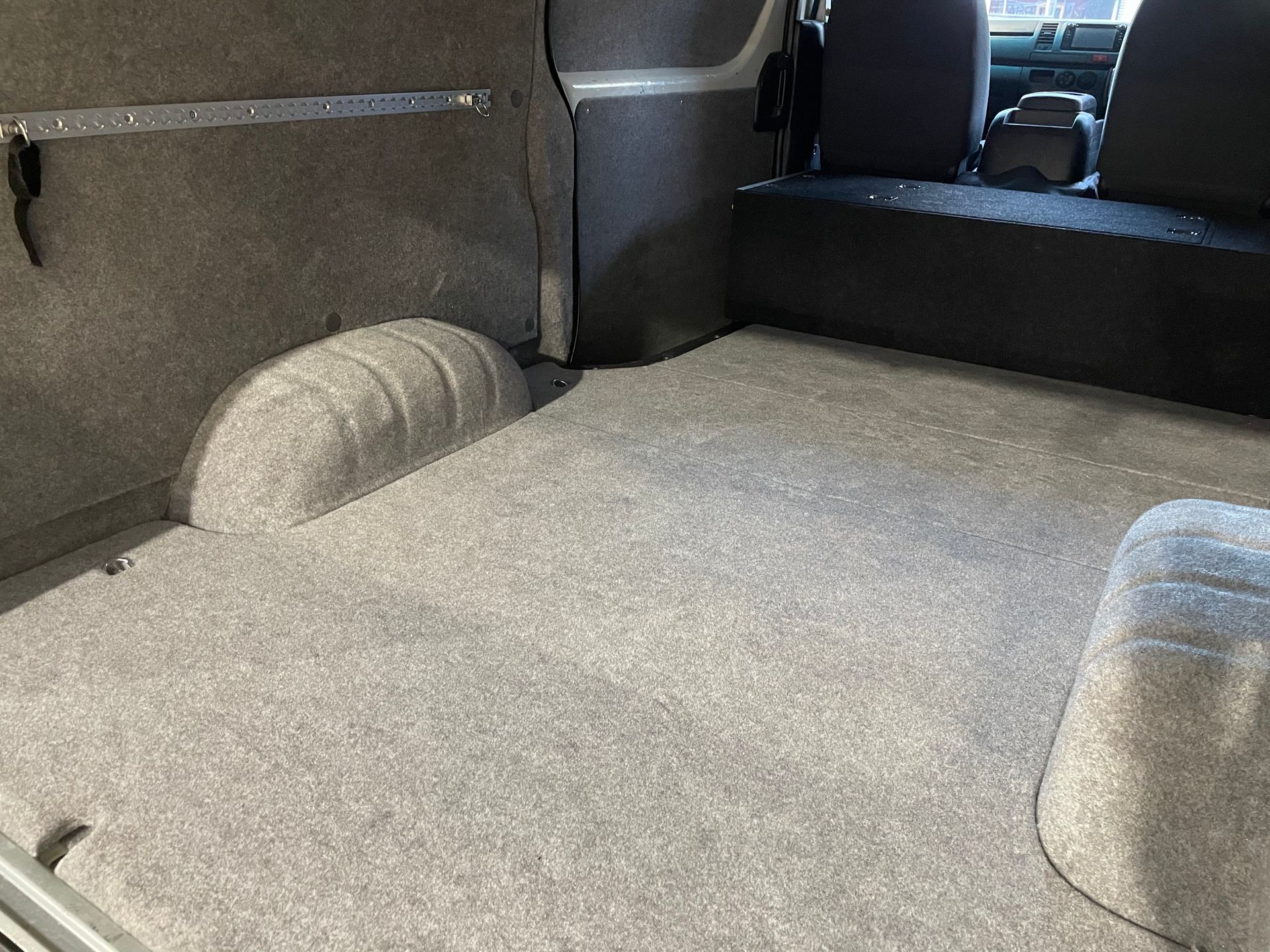 Van floor, walls and ceiling carpeted