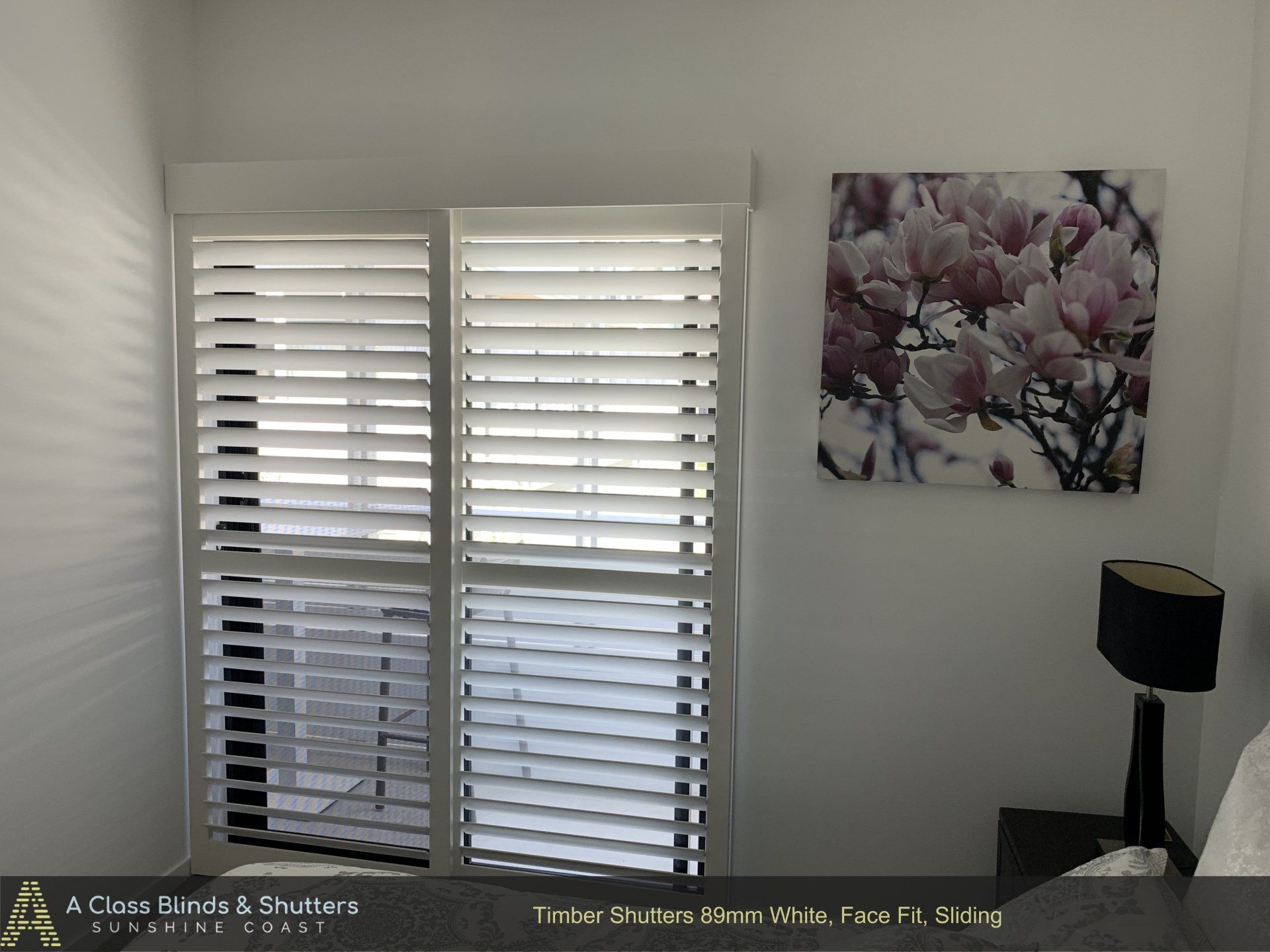window shutter and picture on wall