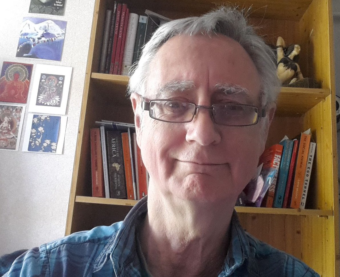 Head and Shoulders picture of of Pete, a white haired older man wearing glasses. 