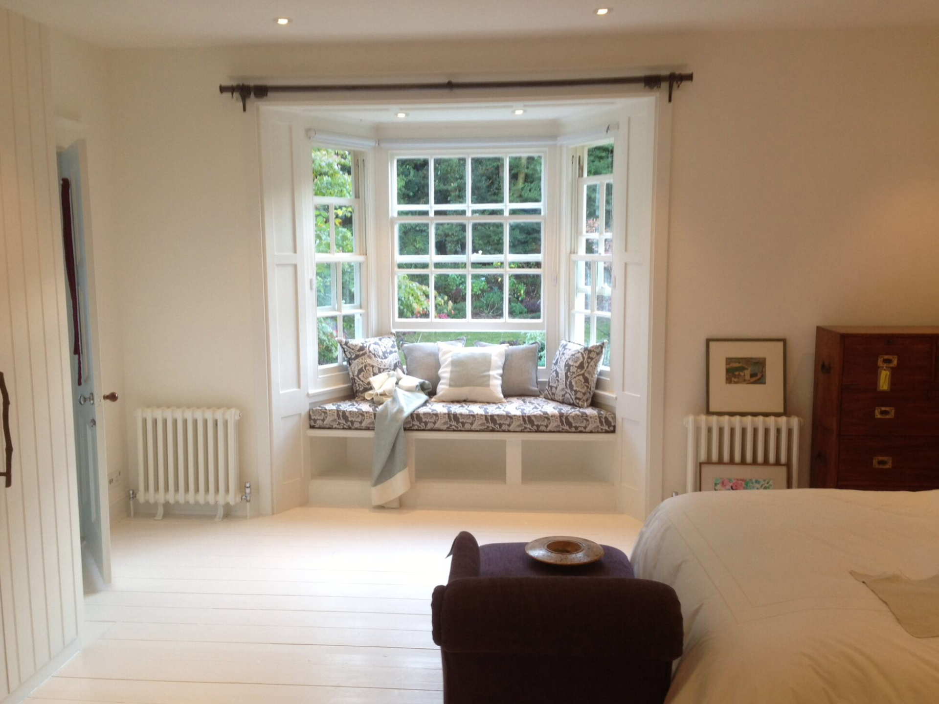 Bedroom with beautiful window set built in