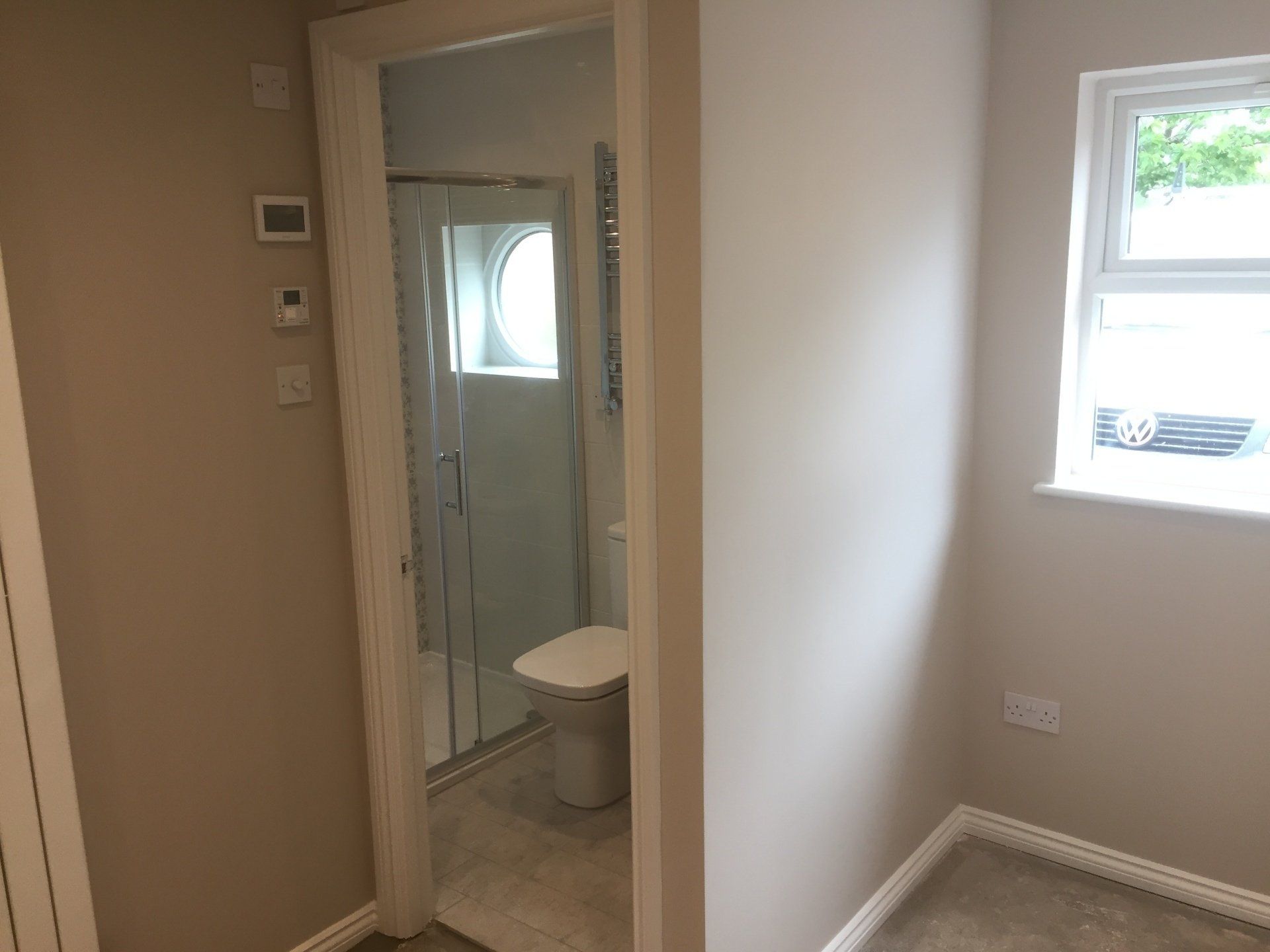 view of finished garage conversion used as cloakroom