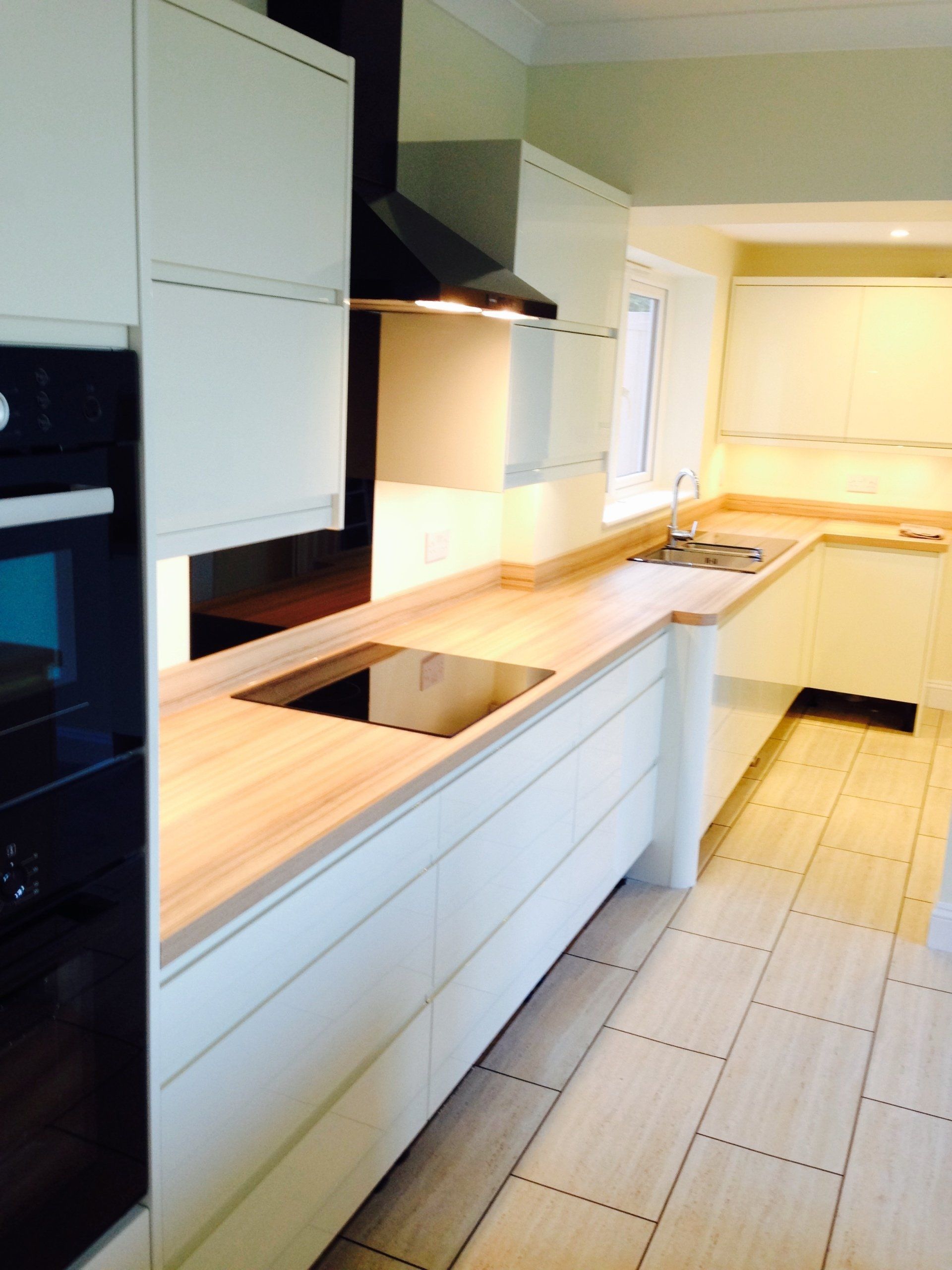 new kitchen with built in appliances empty before client puts things back in