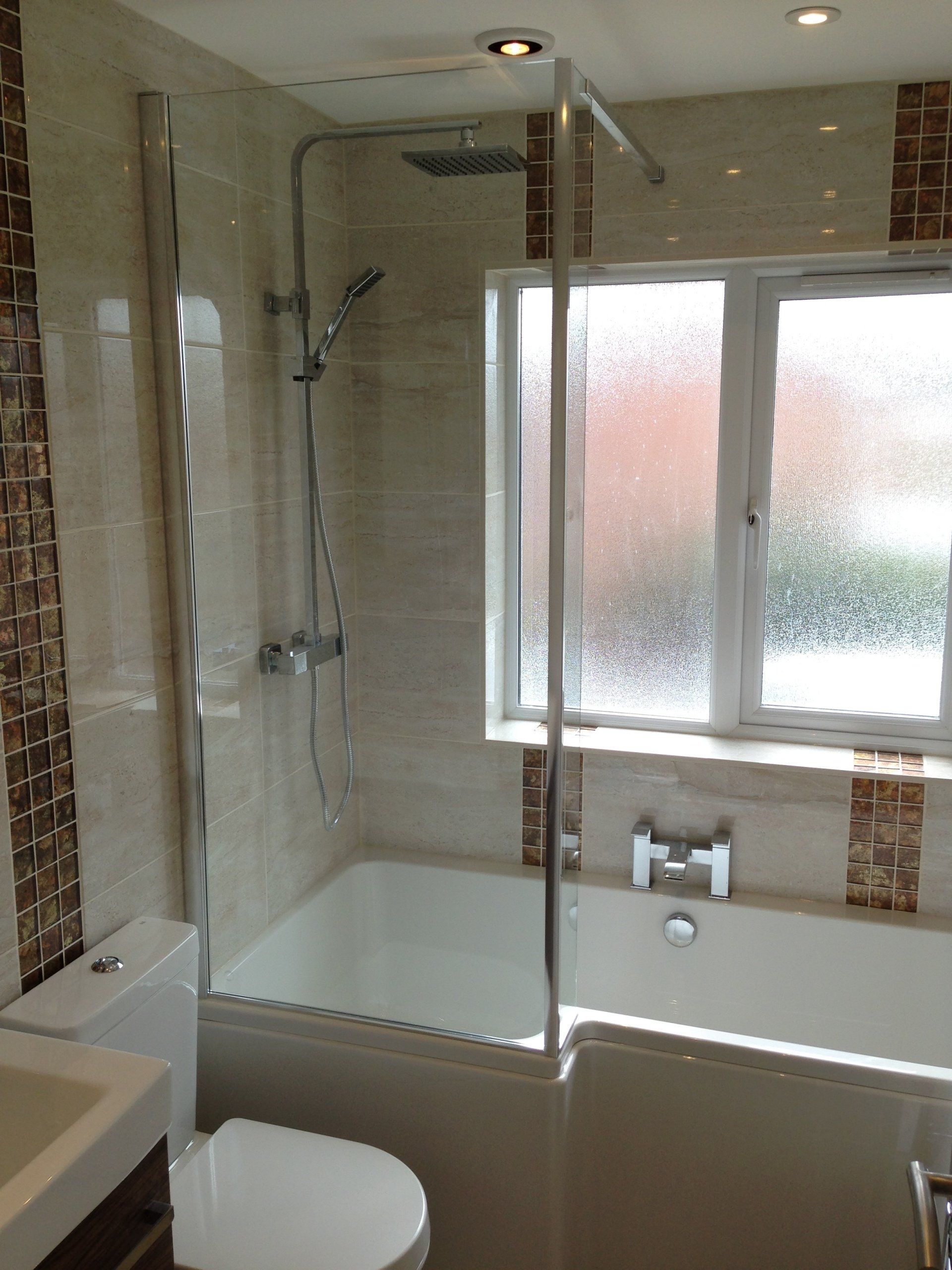 new bath with rainfall shower and glass screen