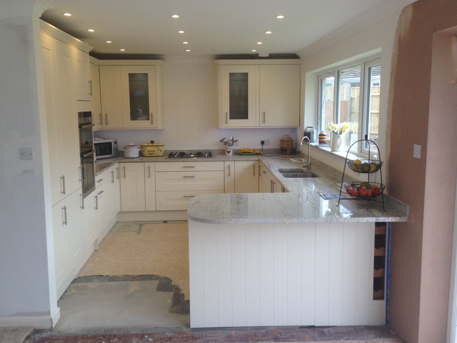 new kitchen before flooring installed