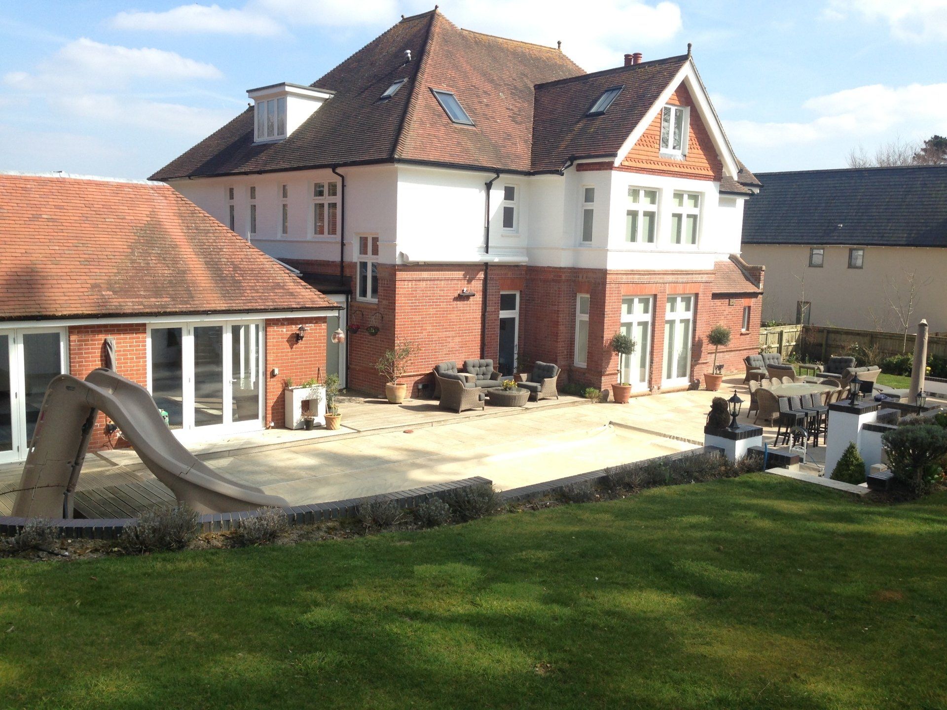 large period property from garden with outdoor kitchen installed and annexe