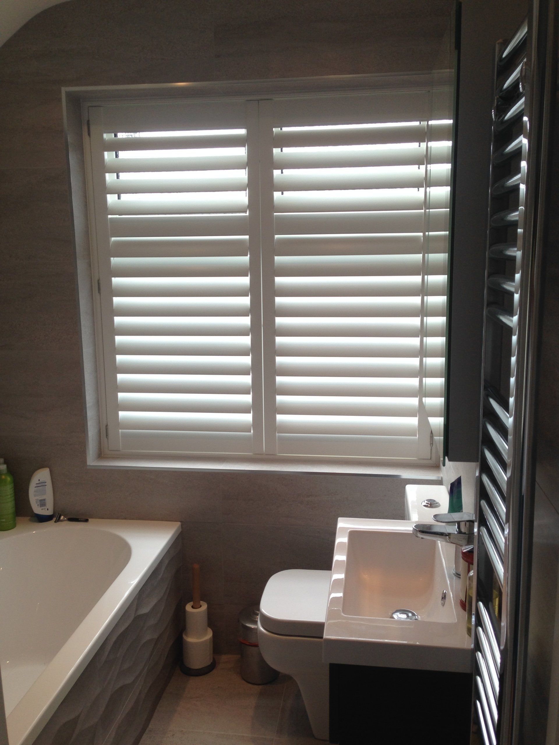 new bathroom with plantation style shutters