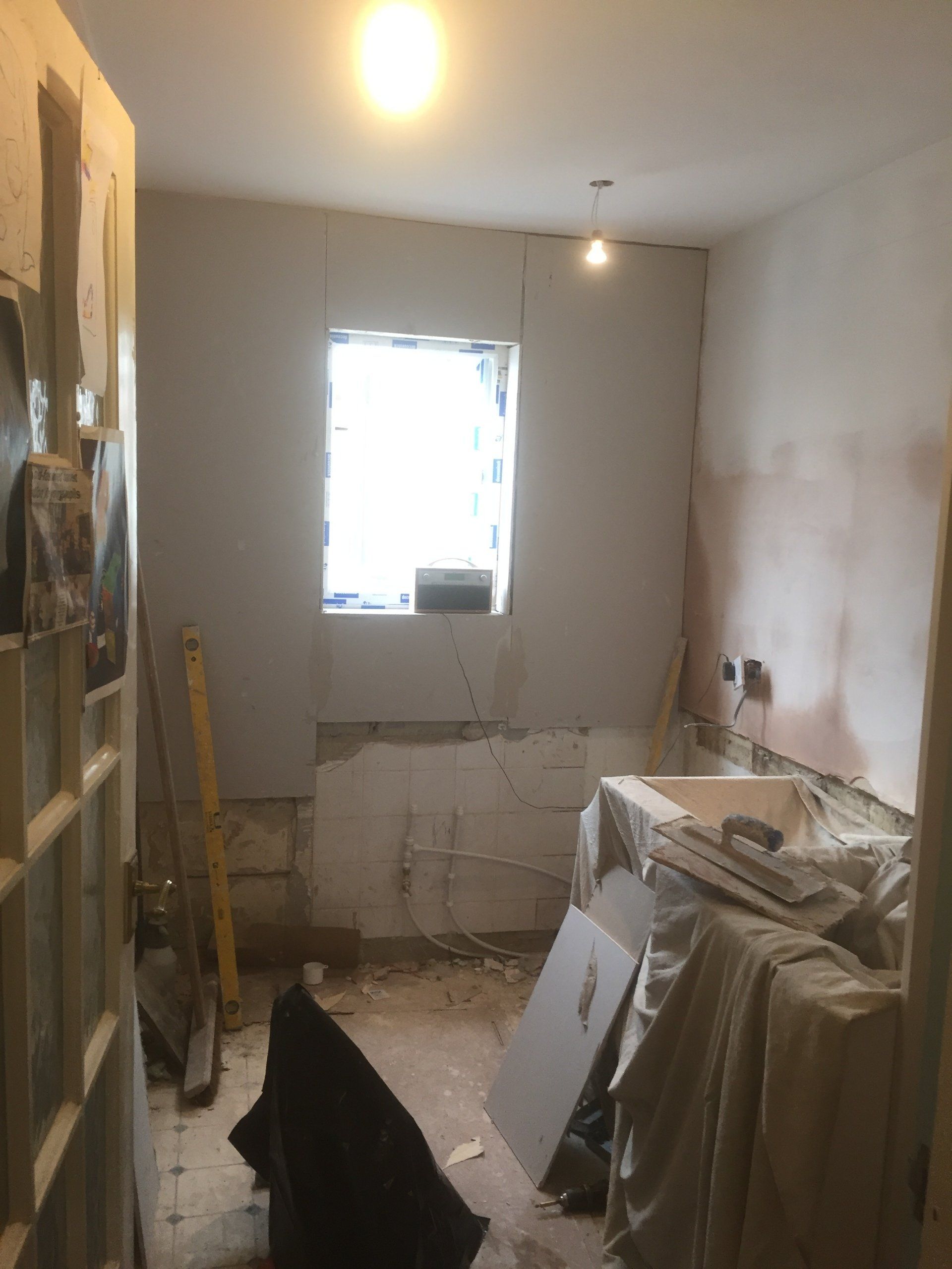 old kitchen ripped out ready for new installation