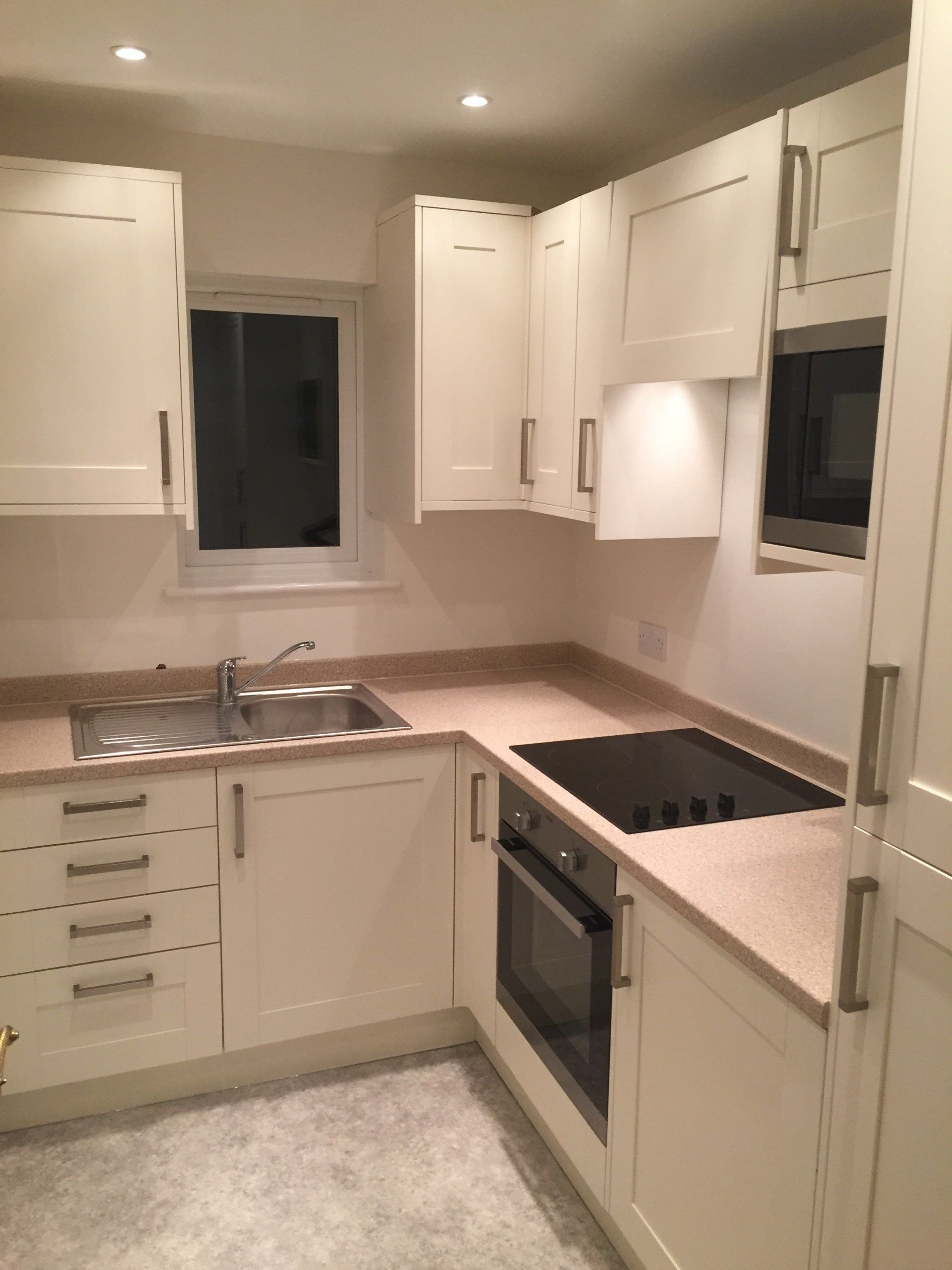 smart new cream coloured kitchen