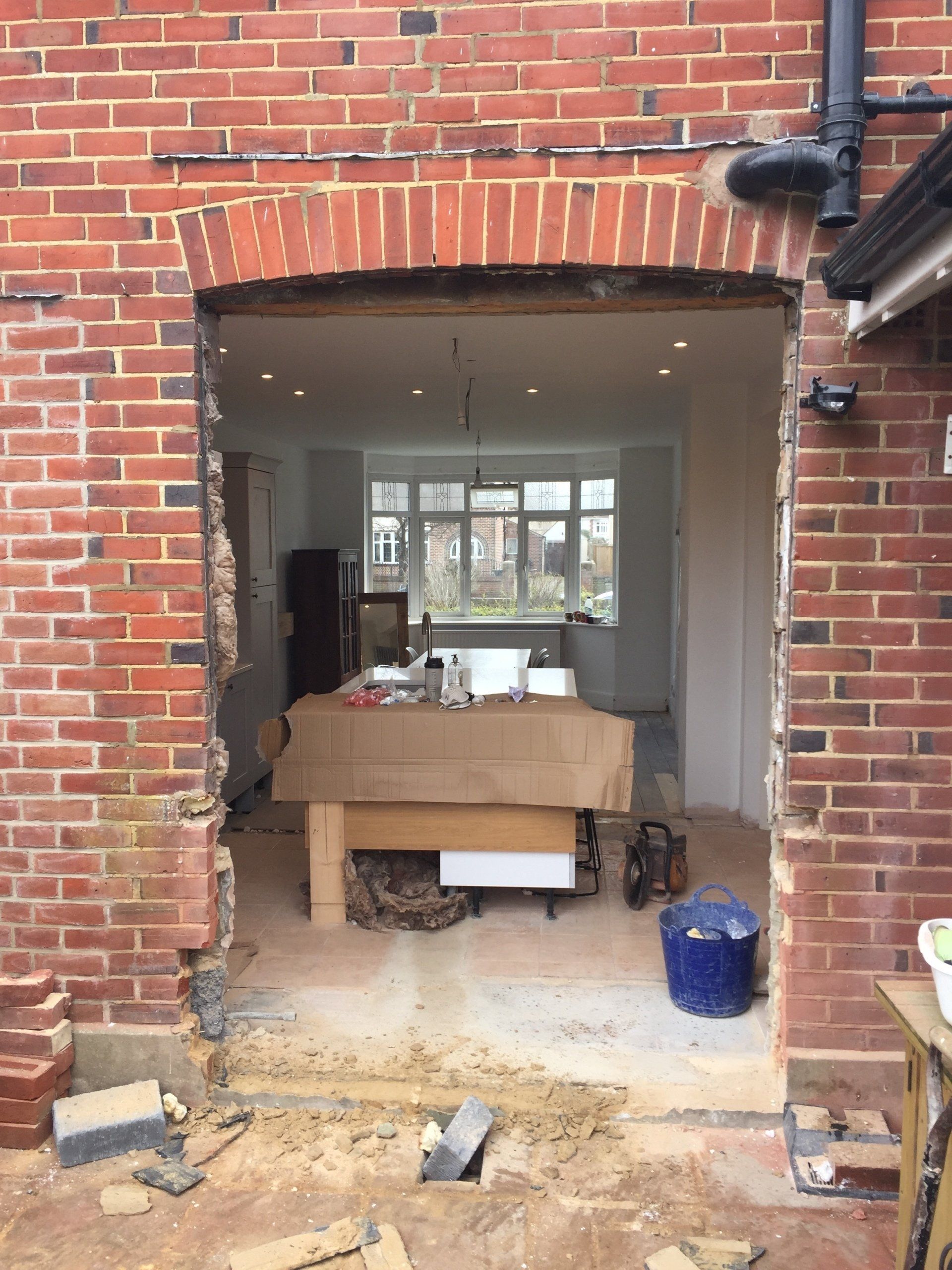 wall knocked through from outside while renovating kitchen