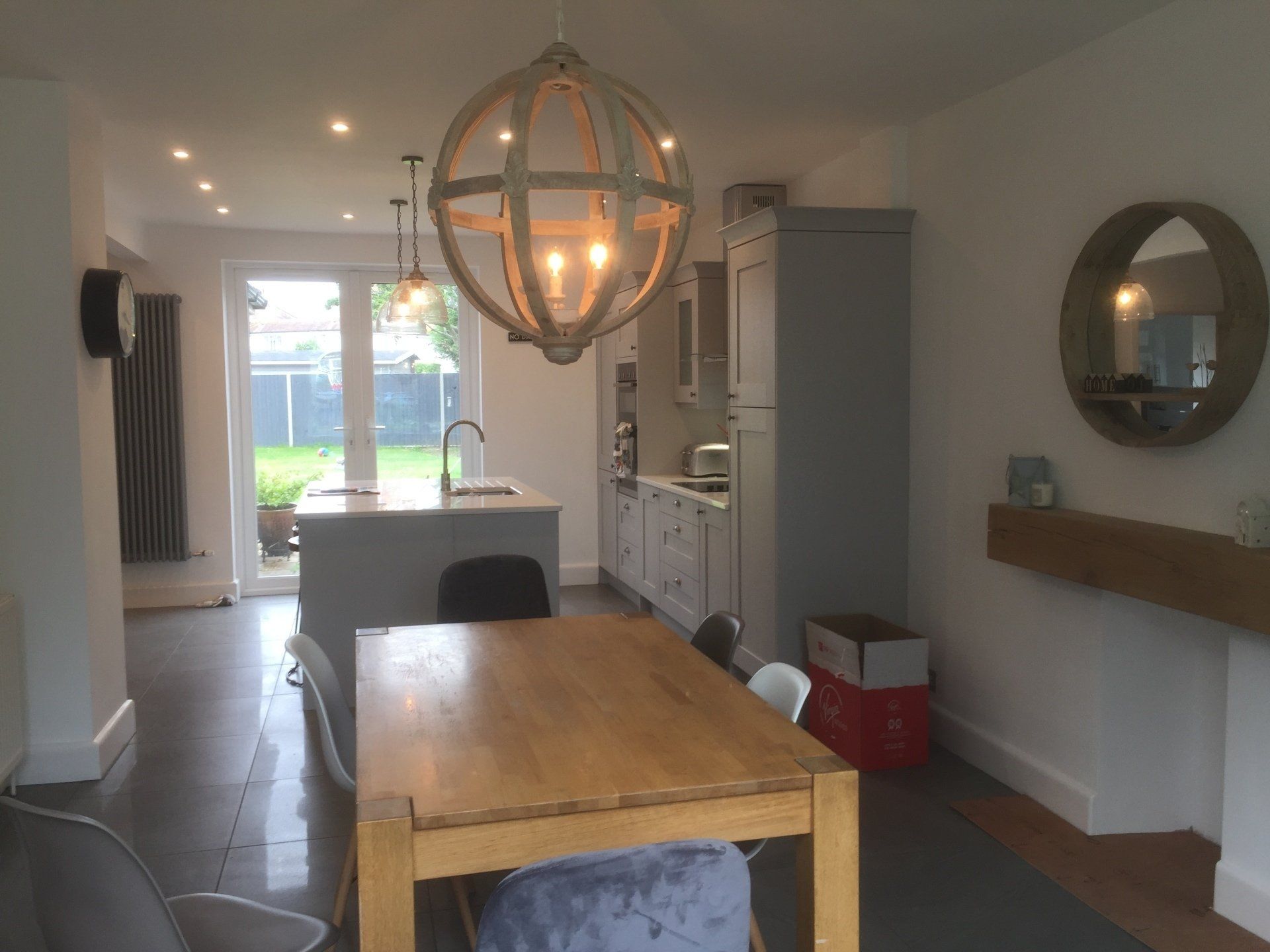 dining area at other end of large walk trhough kitchen