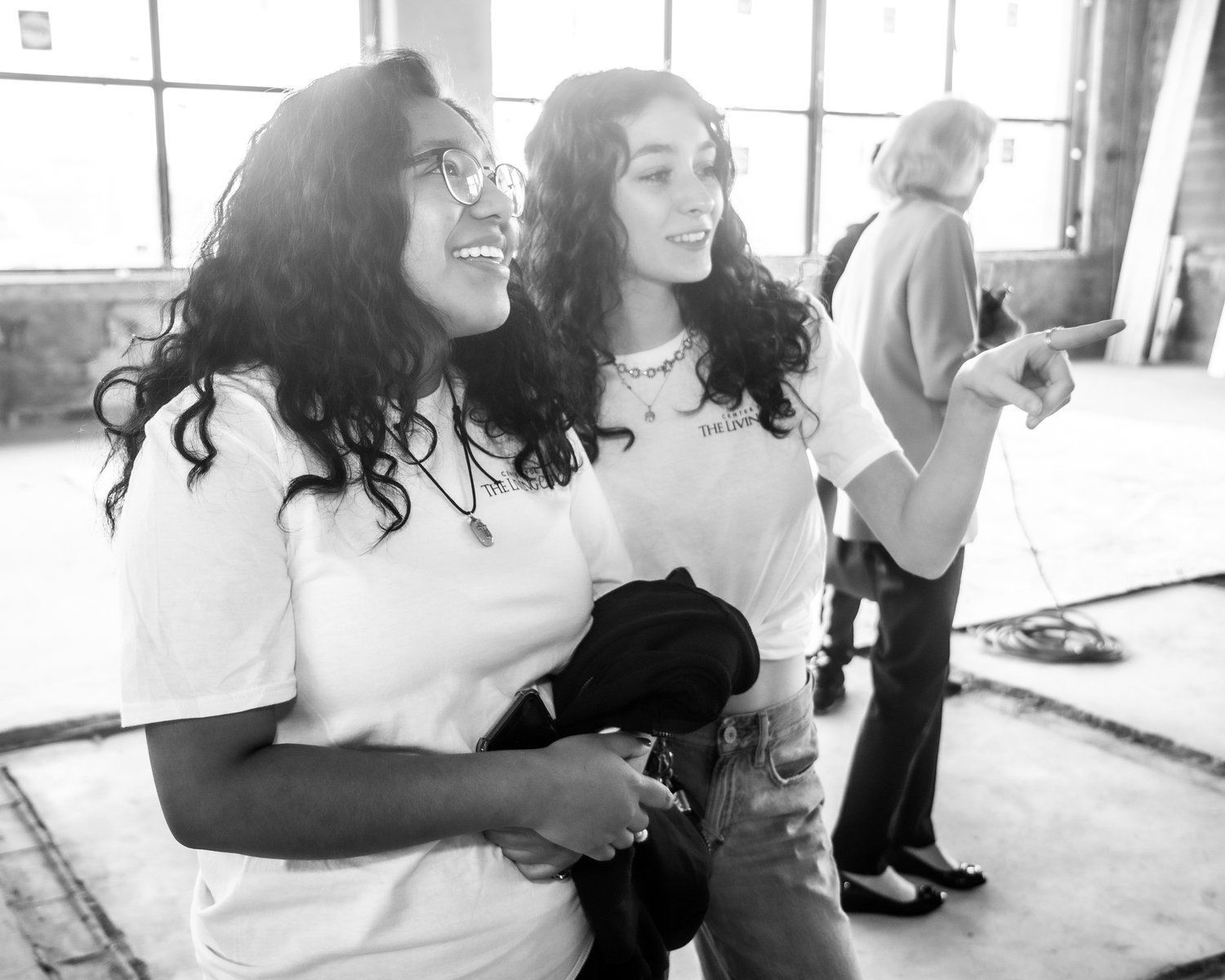 A student sitting at a desk using a laptop computer.