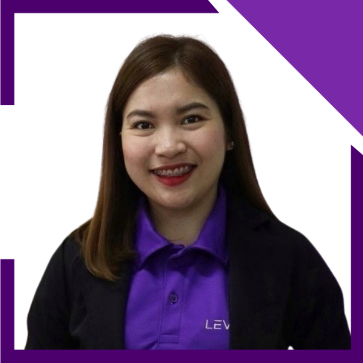 A woman wearing a purple shirt that says lev on it