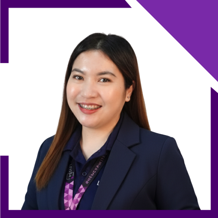 A woman wearing a purple shirt that says lev on it