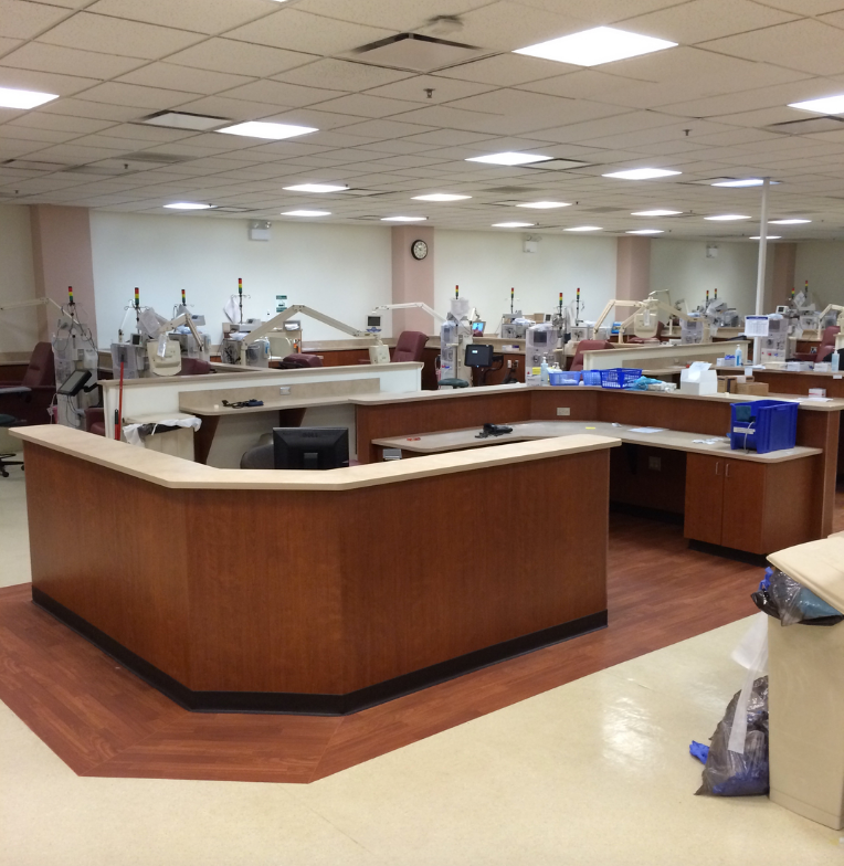 A large room with a clock on the wall