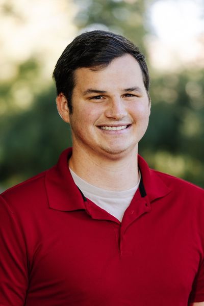 Agent Keith is smiling for the camera.