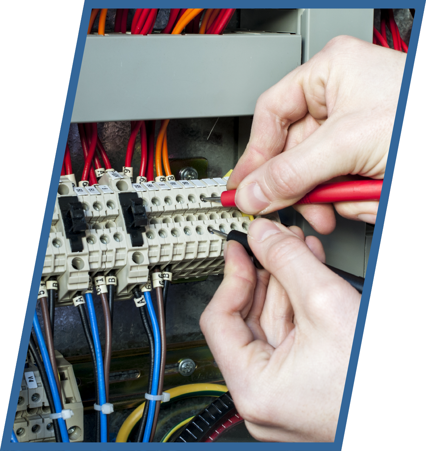 A person is working on a circuit board with a screwdriver