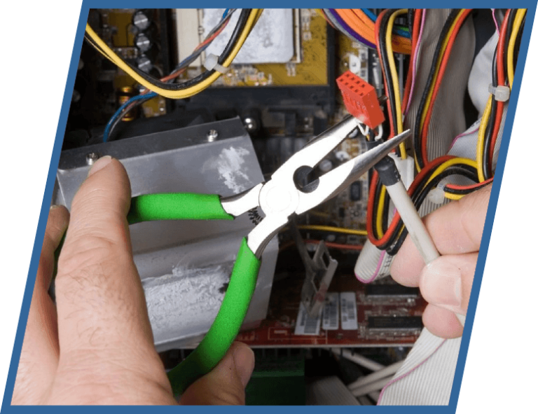 A person is working on a computer with a pair of pliers