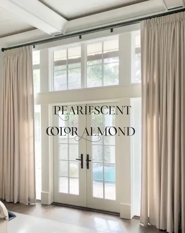 A room with a large window and a sign that says pearlescent color almond