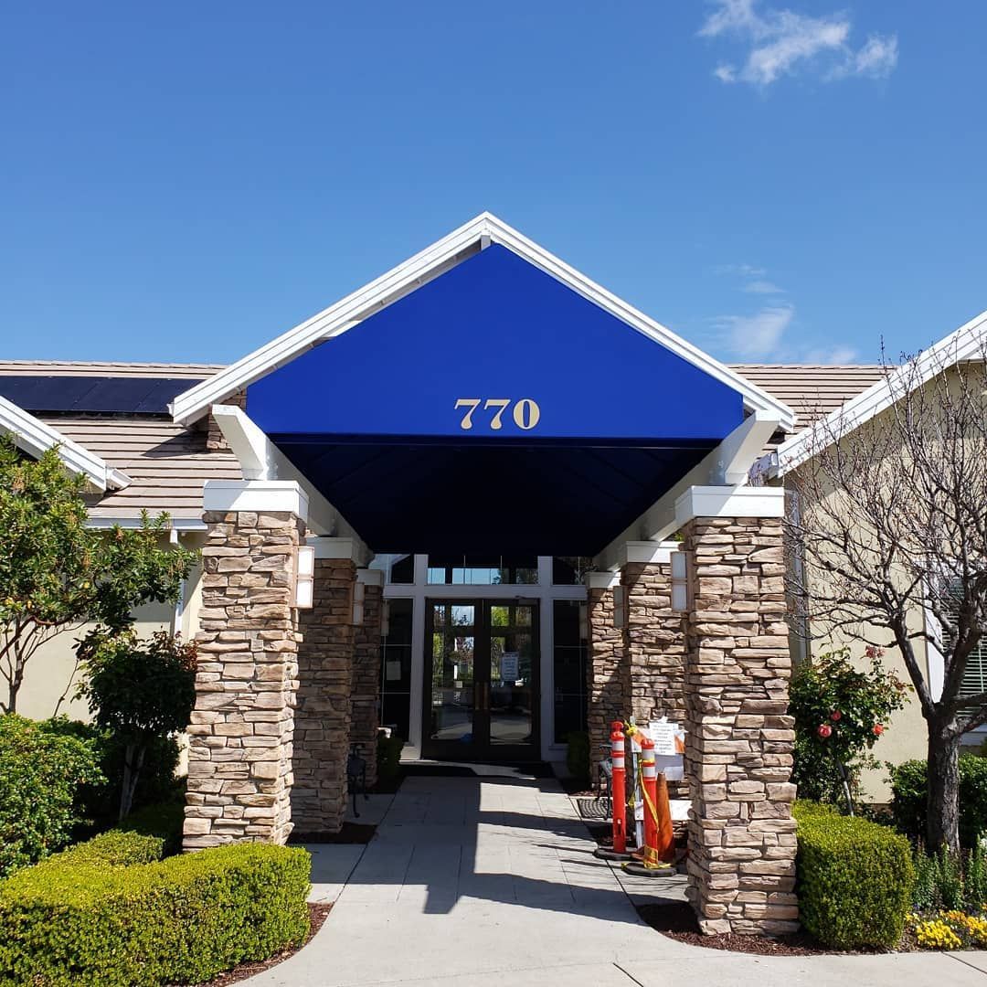 A blue awning with the number 770 on it