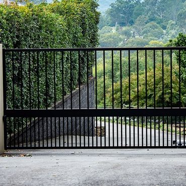 Black Metal Wrought Iron Entrance Gate — Modesto, CA — Sam Farias Fencing, Inc