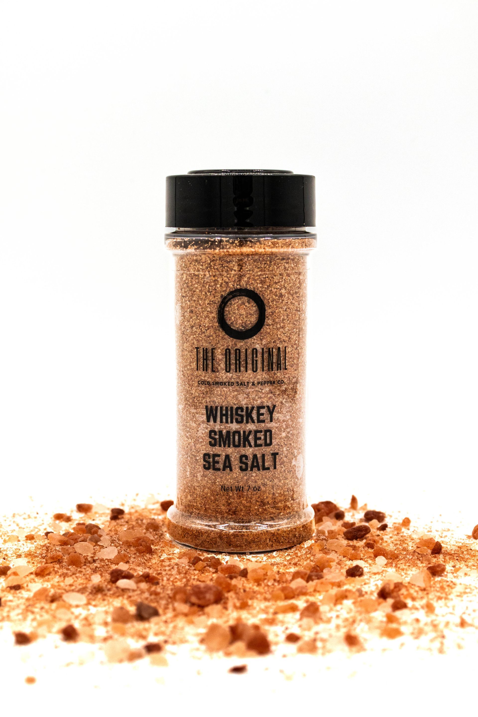 sea salt with wood chips and a glass of whiskey