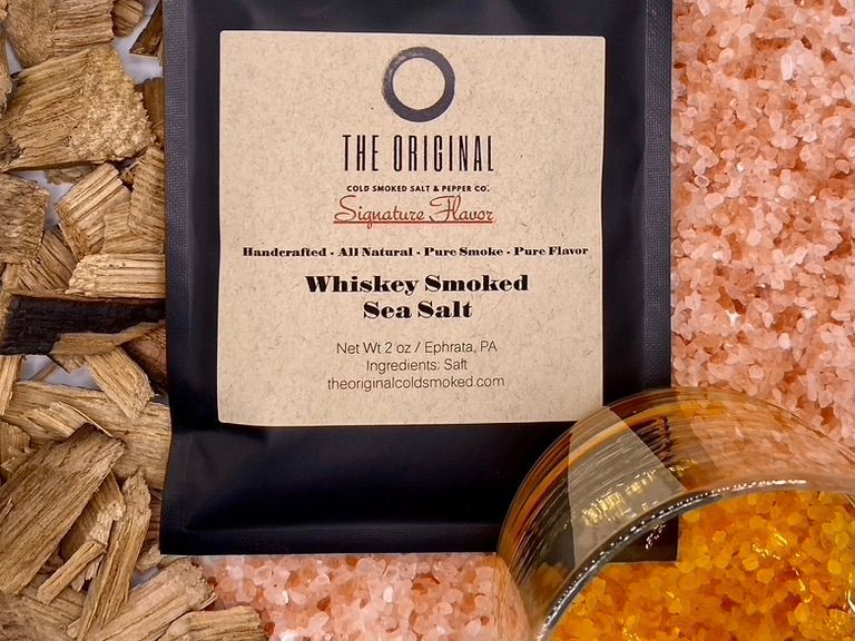 sea salt with wood chips and a glass of whiskey