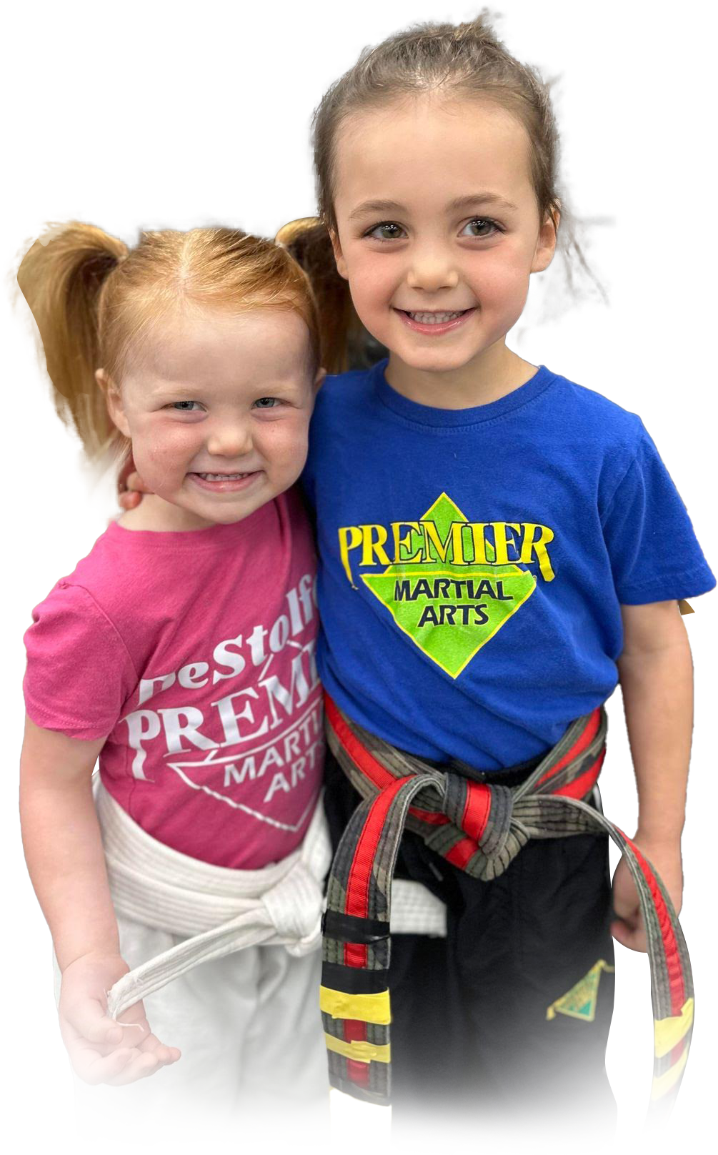 A boy and a girl are practicing karate together.