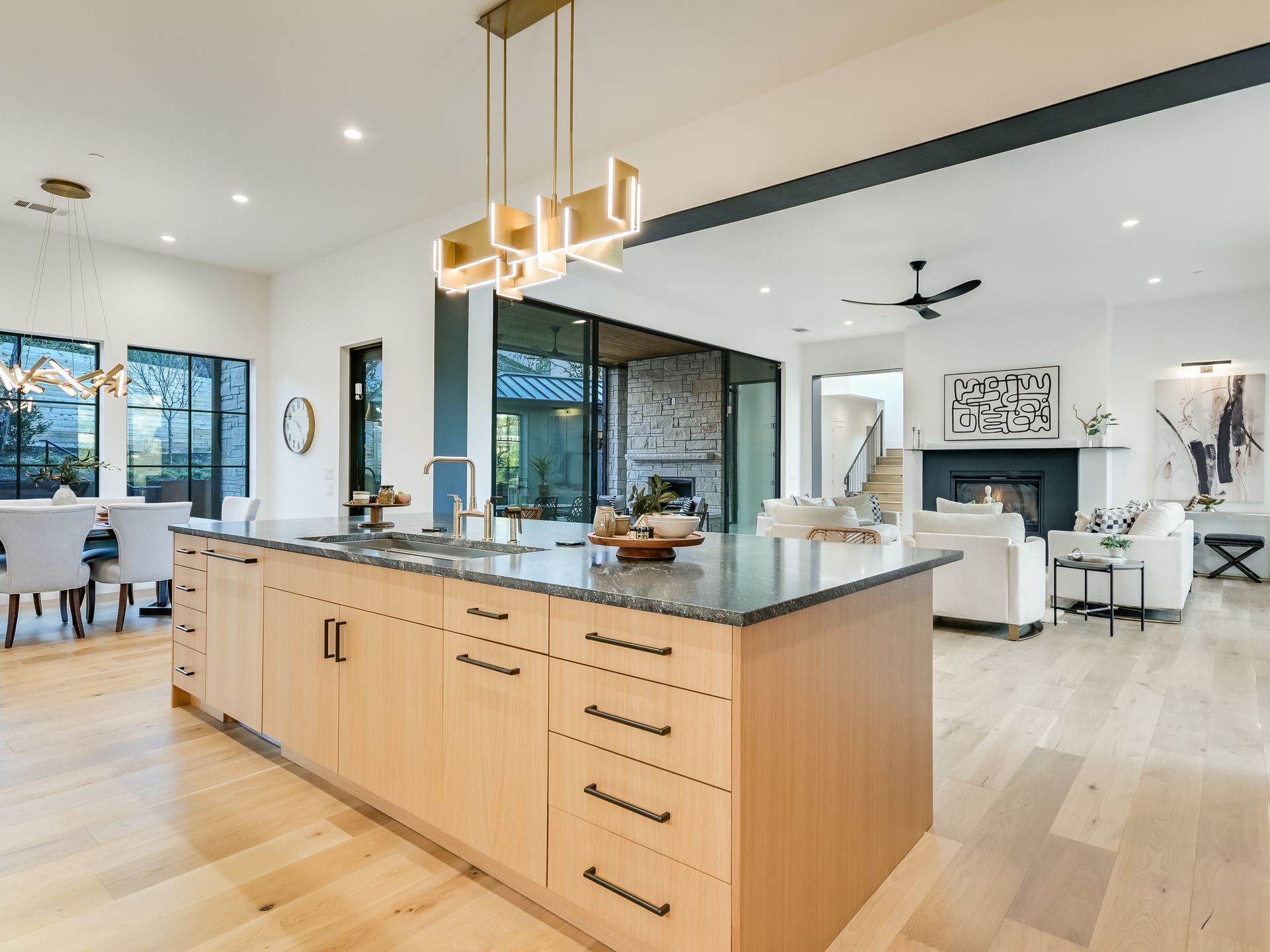 A kitchen with a large island in the middle of the room.