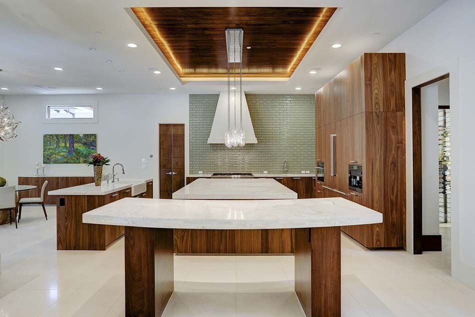 There is a large island in the middle of the kitchen.