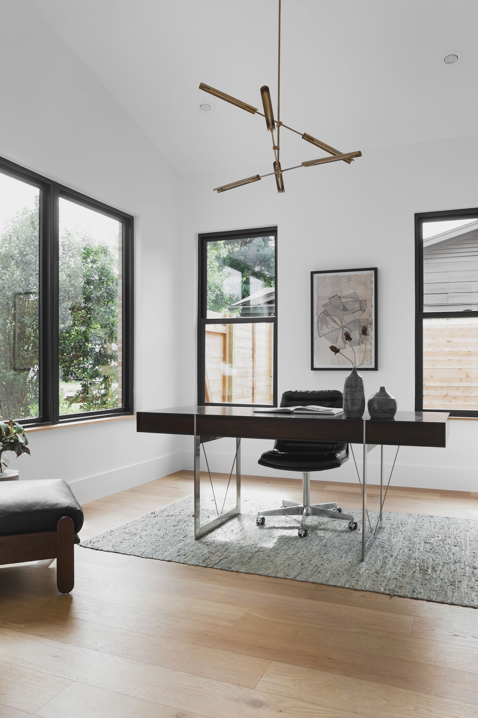 A room with a desk and chair in it