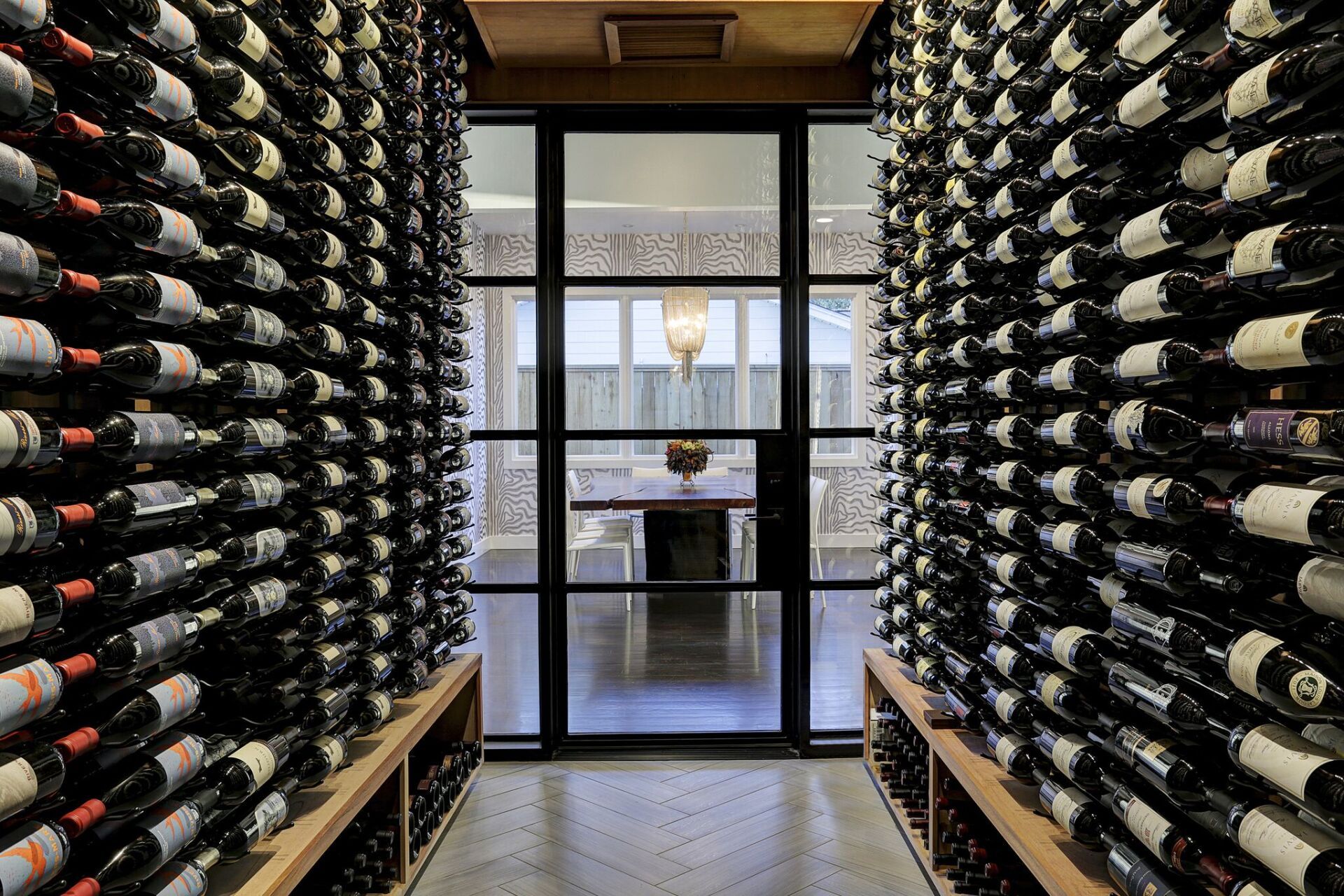 A wine cellar filled with lots of bottles of wine