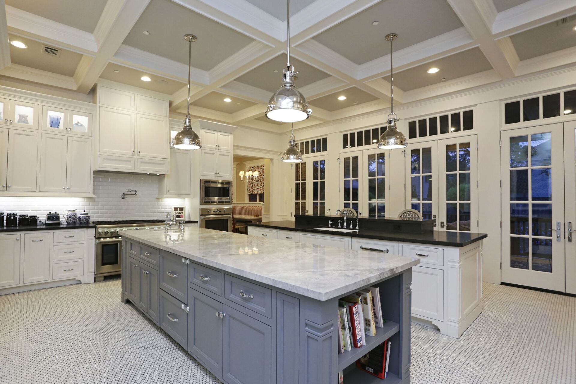 There is a large island in the middle of the kitchen.